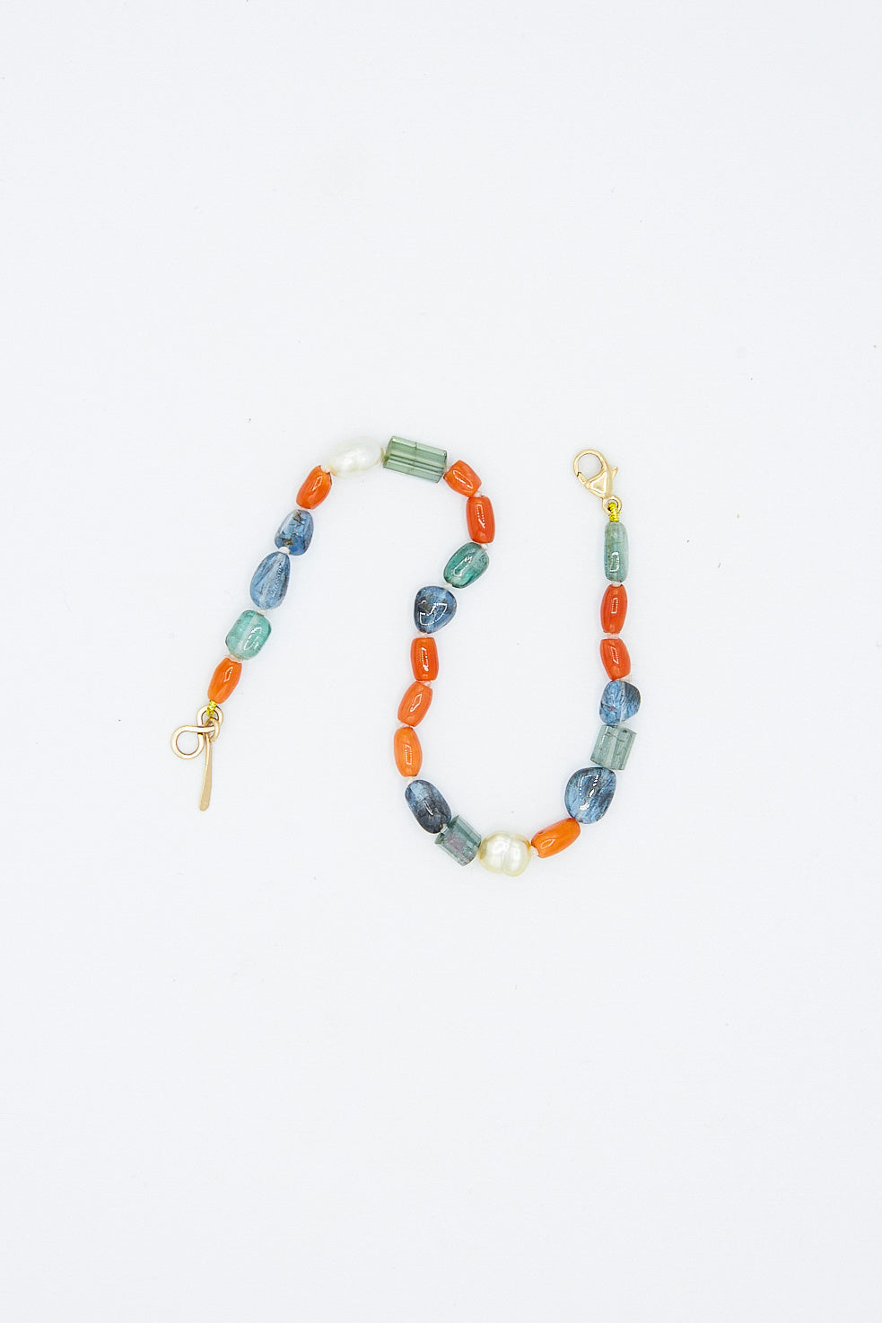 Mary MacGill Egyptian amethyst bead layering bracelet. Overhead view.  Blue, orange, green colored beads.