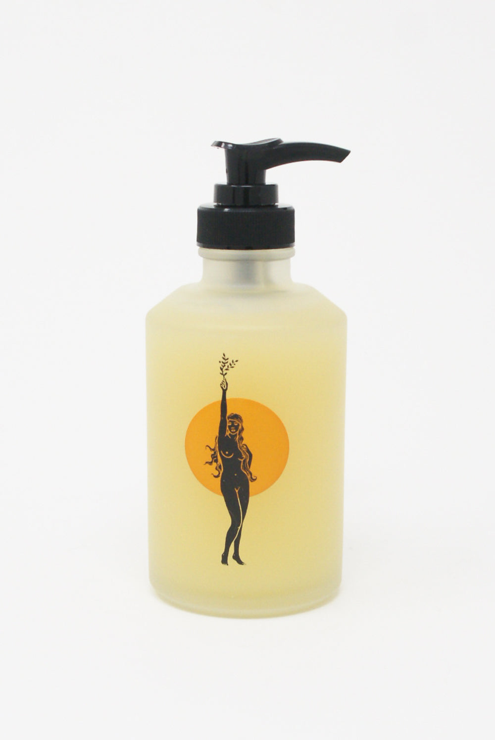A bottle with an image of a woman holding a bottle of Wonder Valley Facial Oil Cleanser.