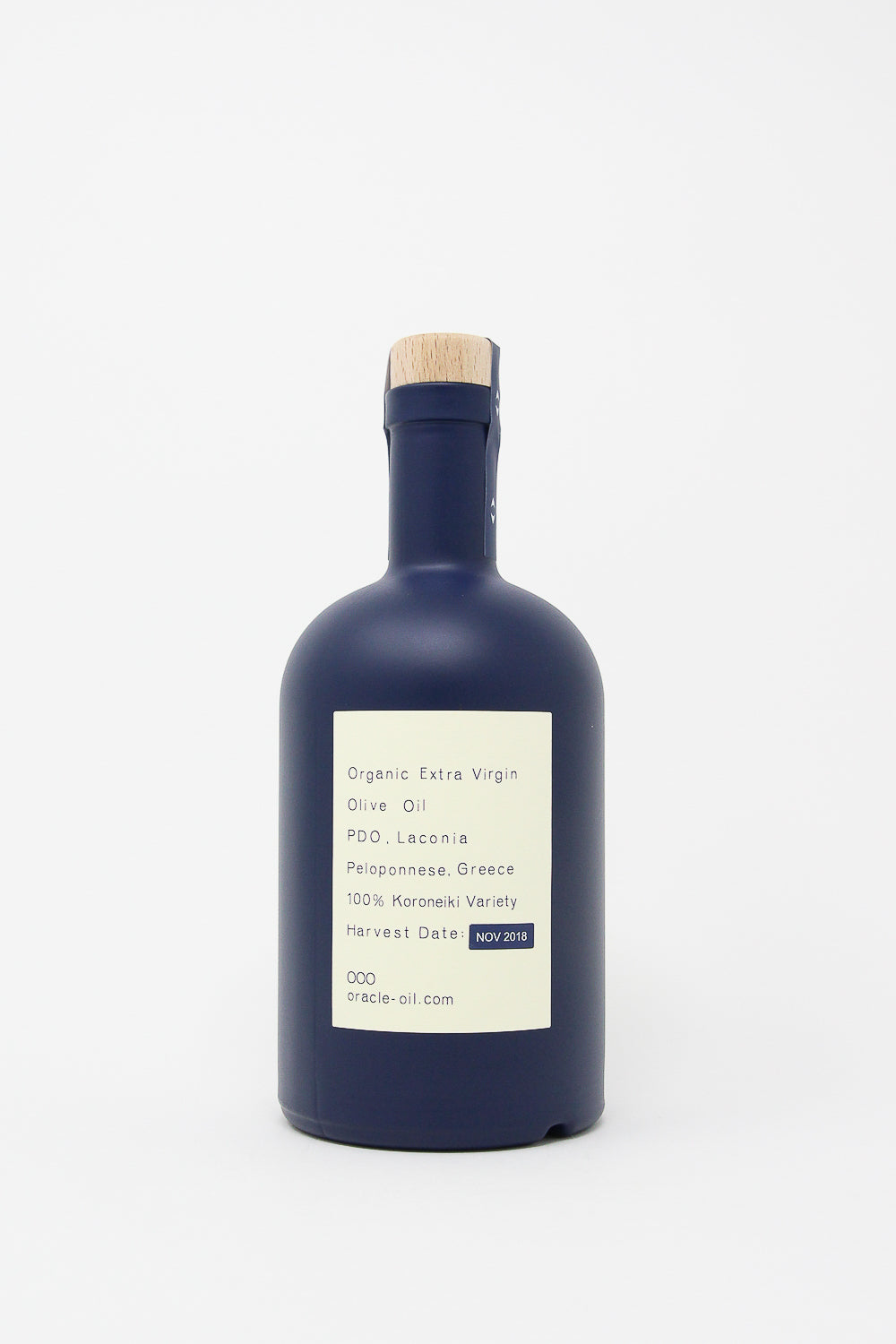 A bottle of organic Oracle Oil - Olive Oil with a blue label on a white background.