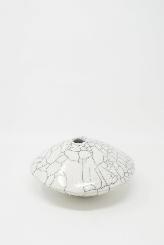A white, crackle-glazed Ikebana Vase in Raku-Fired Stoneware dish from MONDAYS on a plain background.