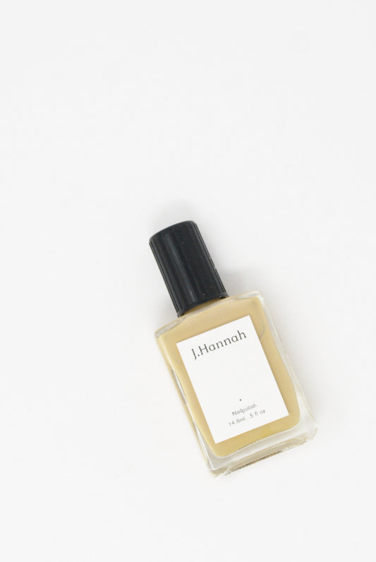 J Hannah Nail Polish in Relic (Color: Nude). Overhead view.