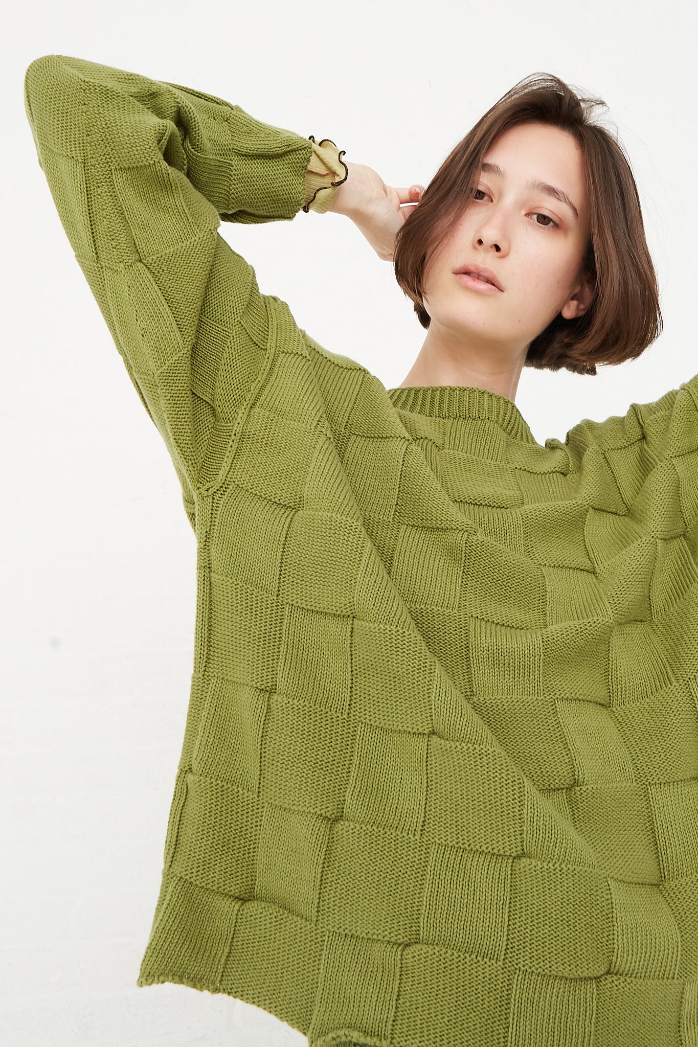 Baserange - Konak Sweater in Zek Green front sleeve detail