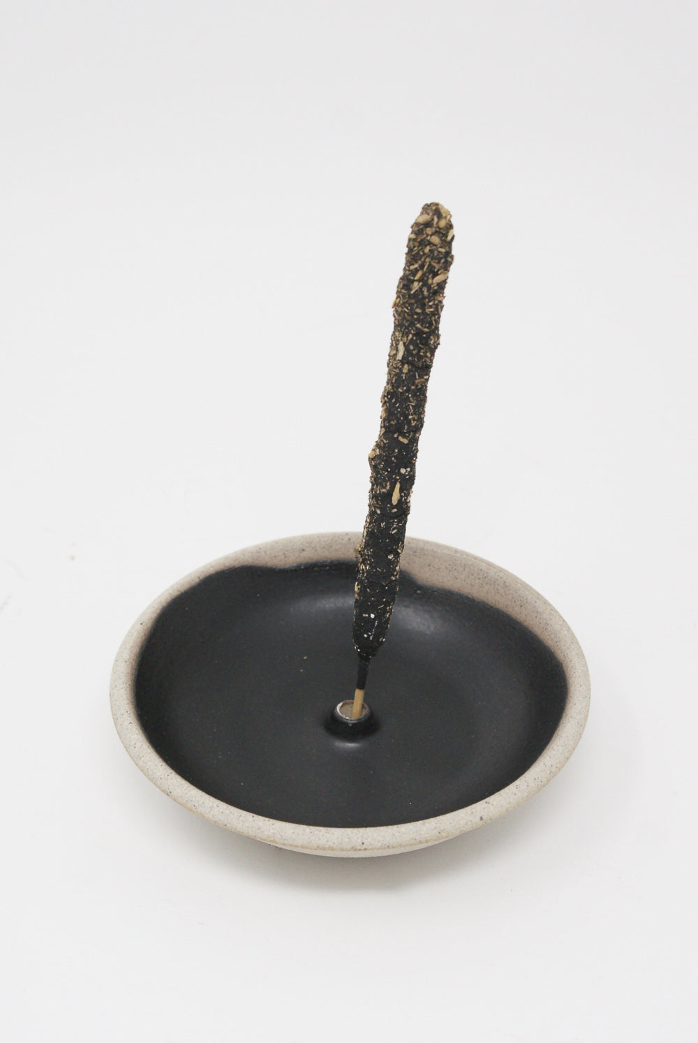 Incausa - Stoneware Incense Holder in Black with incense