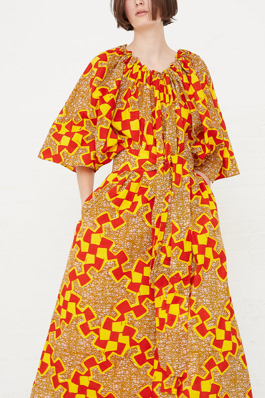 Odile Jacobs - Arielle Dress in Yellow/Red hand in pockets front detail