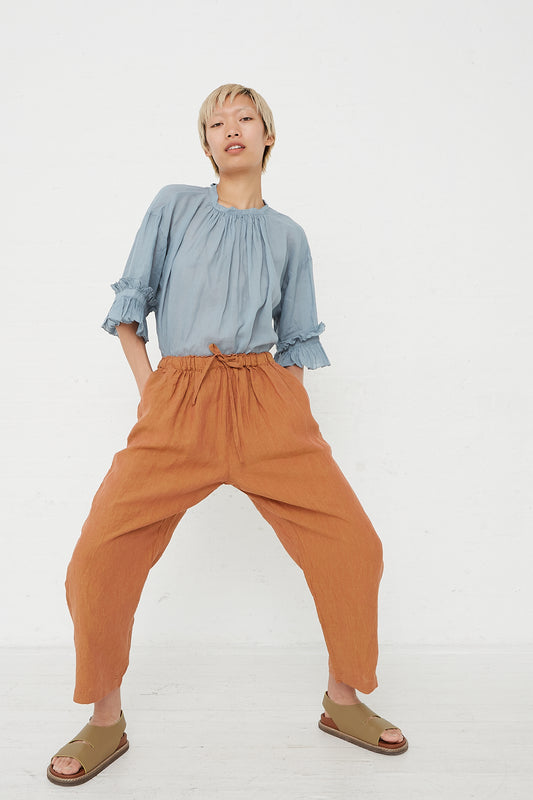 nest Robe - Hemp Yarn Dyed Easy Fit Pant in Brick front view with hands in pockets