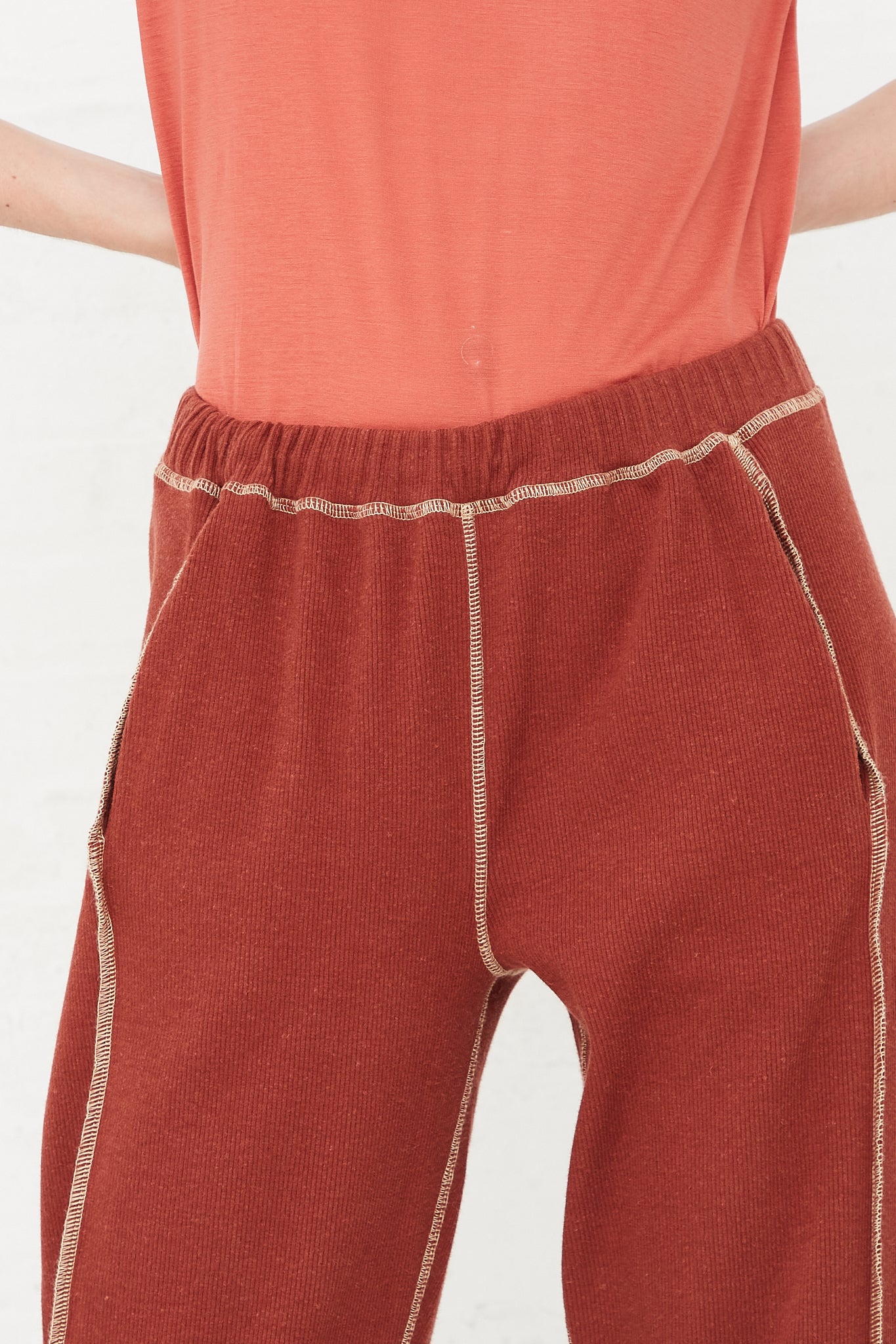 Baserange - Omato Sweatpants in Burned Punica front waist detail
