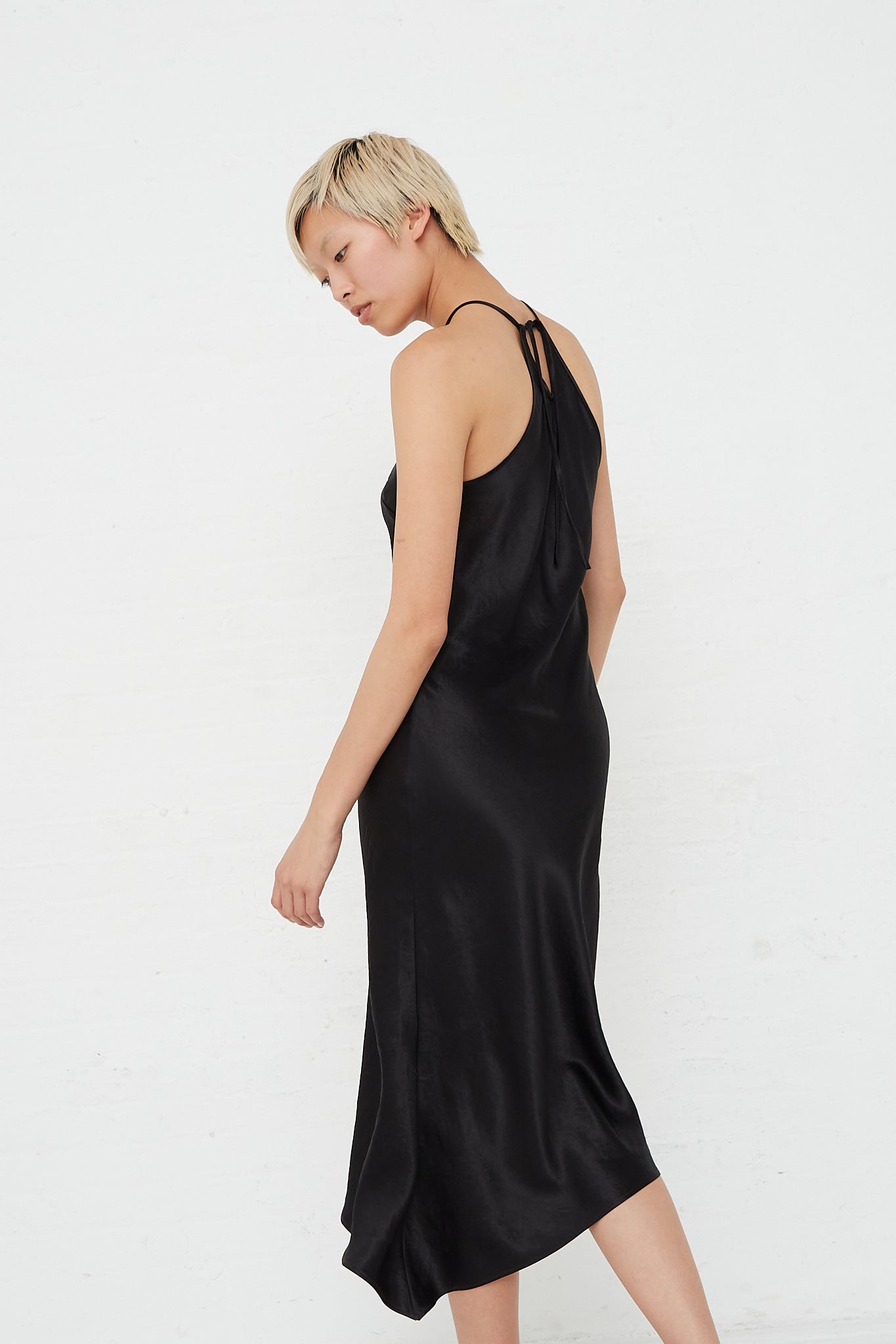 Nomia - Halter Bias Dress in Black side view