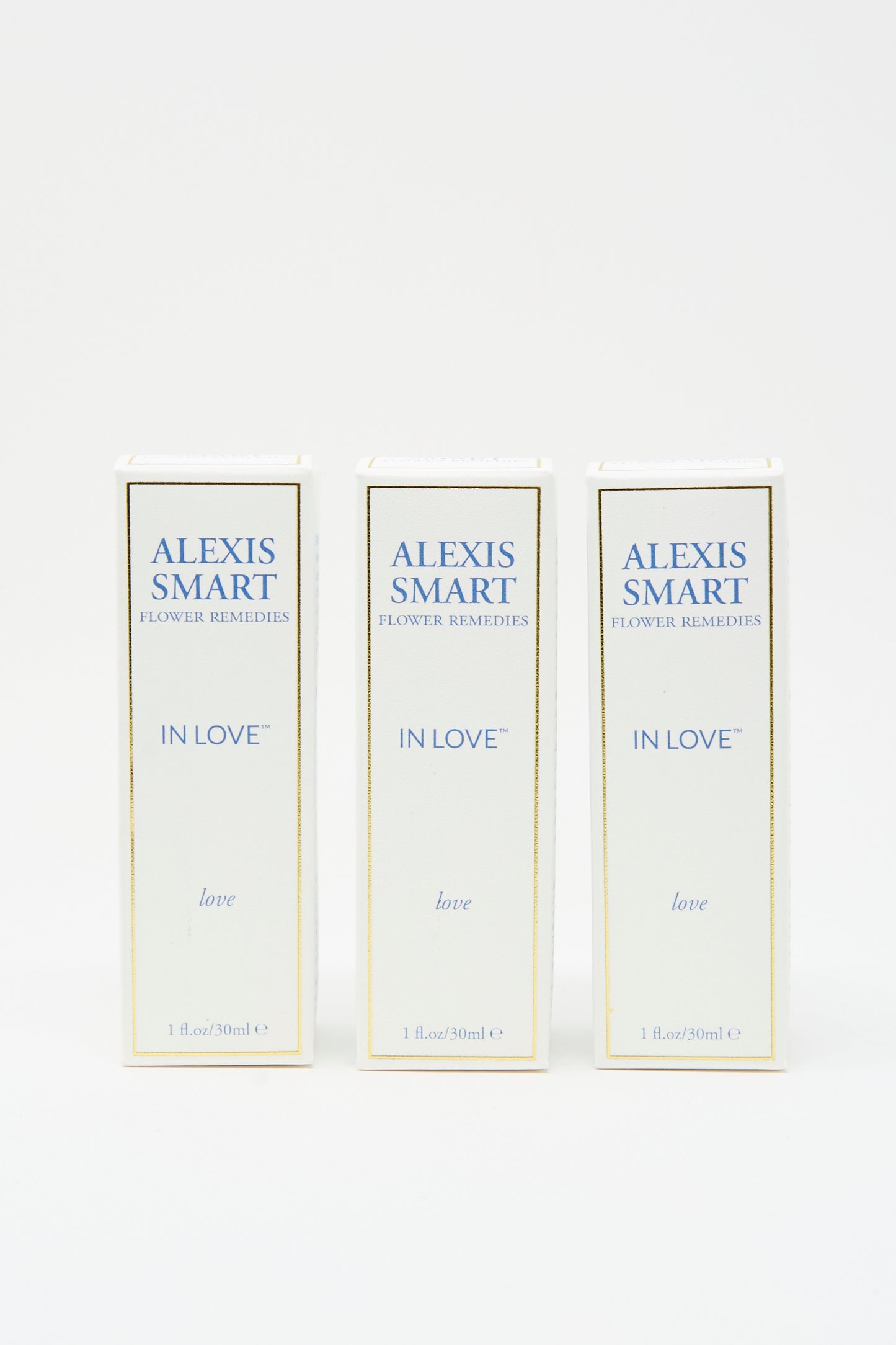 Three boxes of Alexis Smart Flower Remedies - In Love, featuring flower essences that support self-love and healthy relationships, displayed upright against a plain white background.