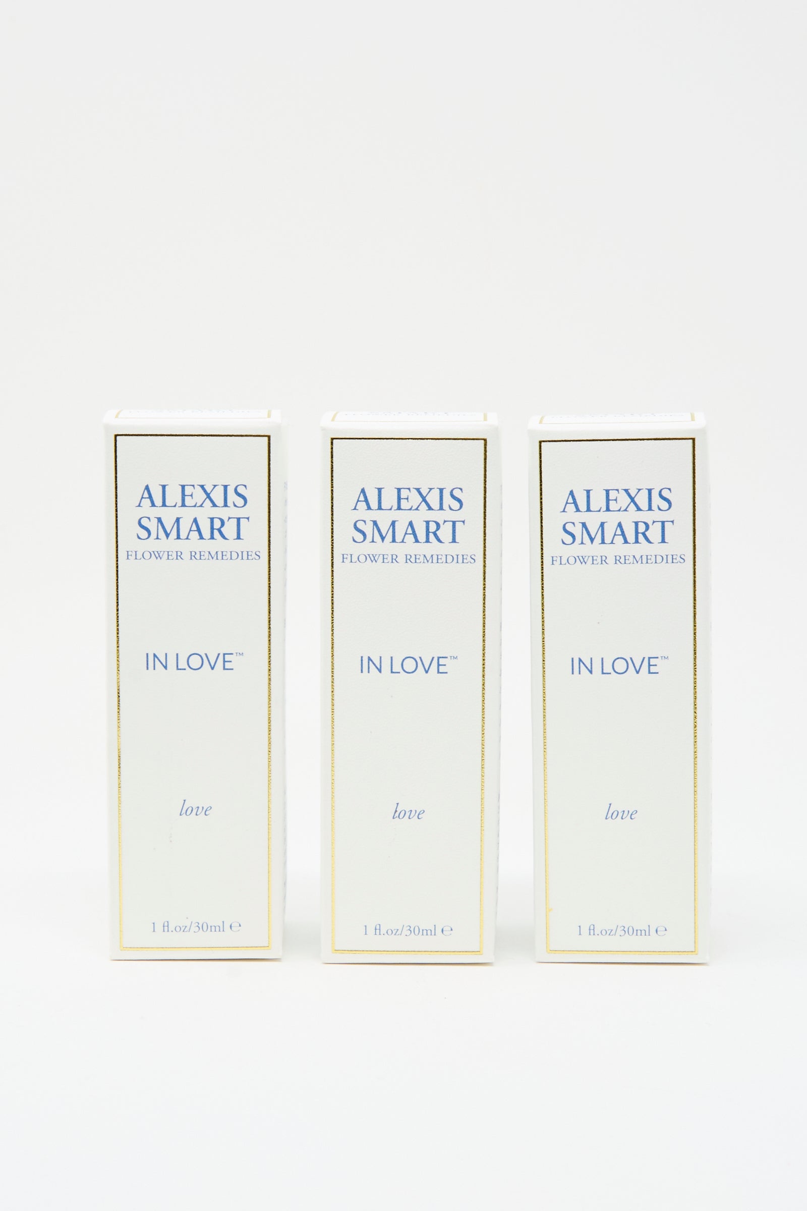 Three boxes of Alexis Smart Flower Remedies - In Love, featuring flower essences that support self-love and healthy relationships, displayed upright against a plain white background.