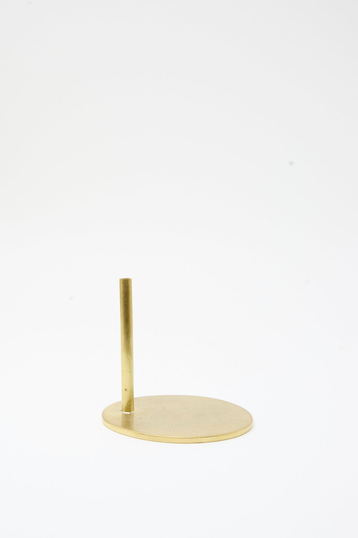 Small gold-colored Brass Base - Small with a circular bottom and a single vertical rod for Papaver sculptures.