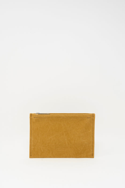 The Amiacalva Washed Canvas Medium Pouch in Mustard is a small, rectangular pouch with a top zipper, shown upright against a plain white background.