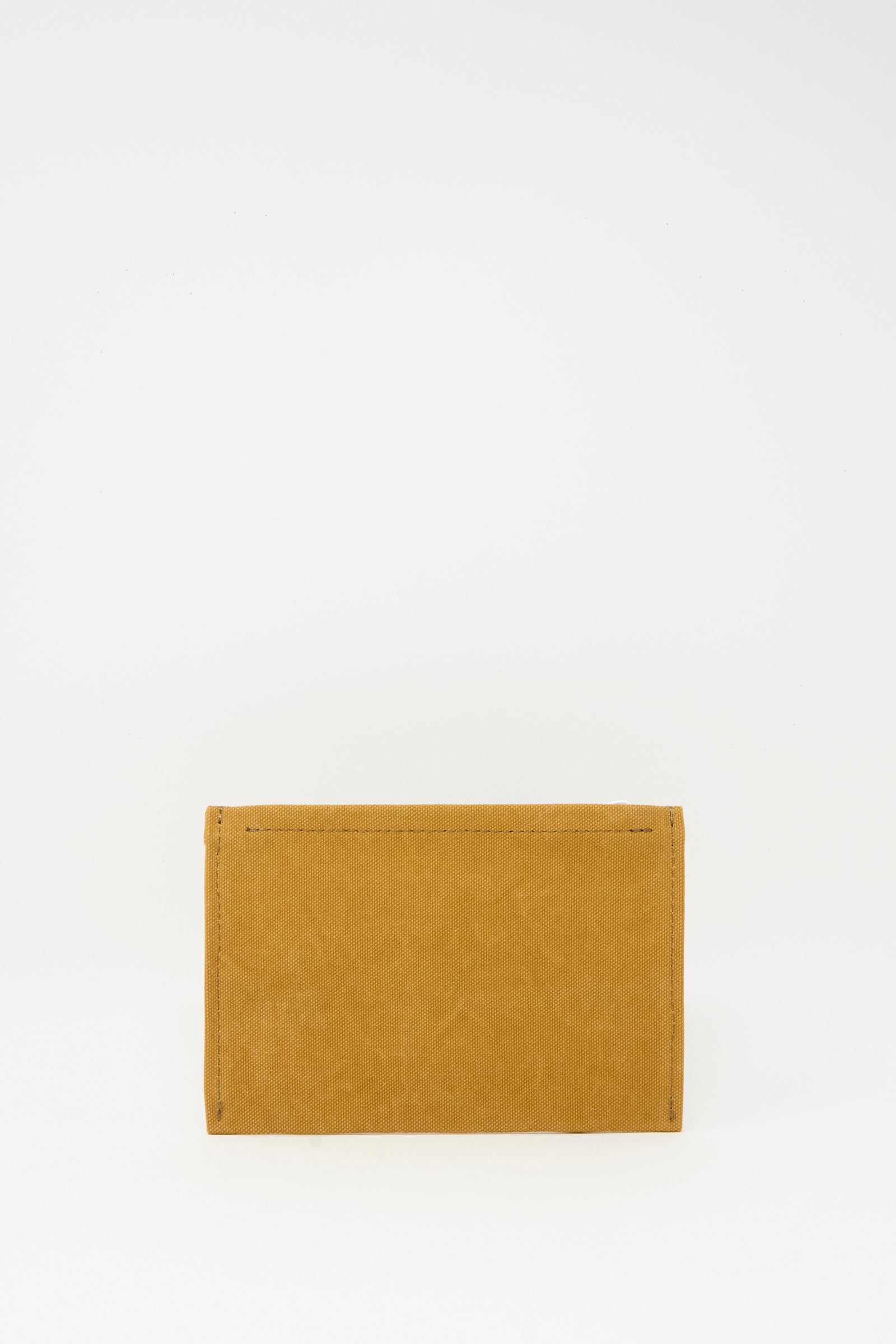 The Amiacalva Washed Canvas Medium Pouch in Mustard is shown upright against a plain white background.