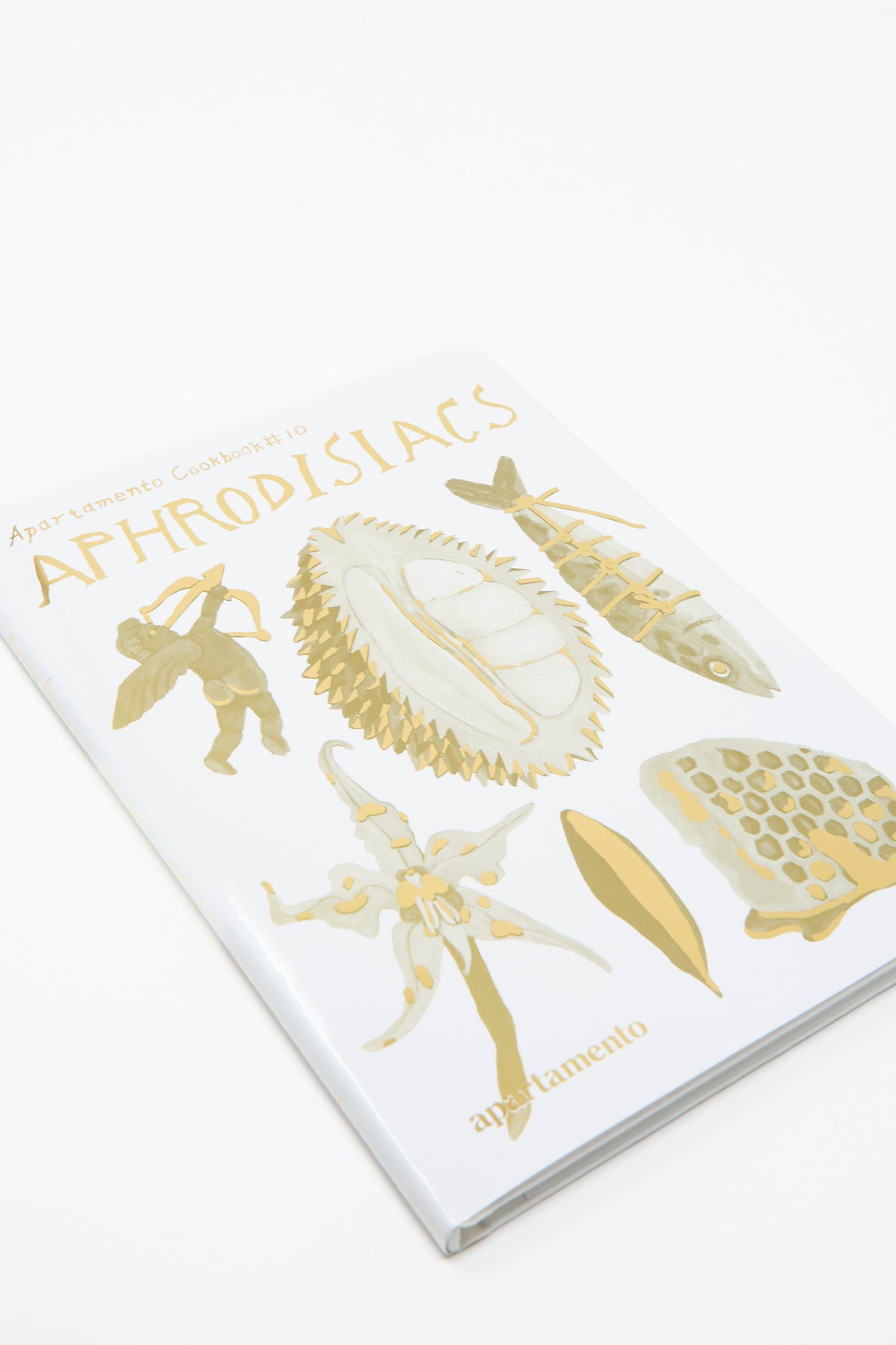 Cover of Cookbook #10: Aphrodisiacs by Apartamento, featuring gold illustrations of Cupid, a durian, a tied fish, a flower, and honeycomb.