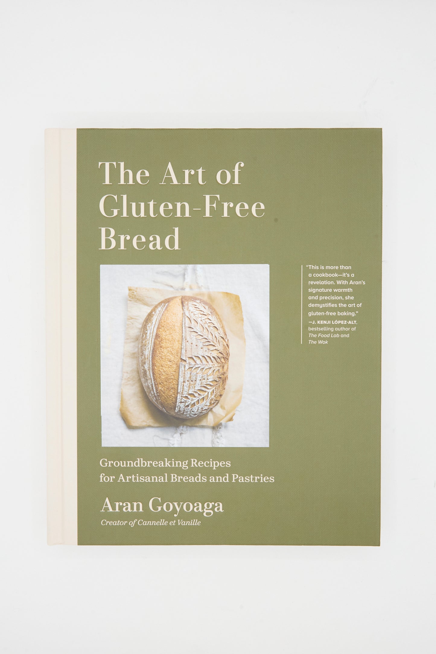 The cover of "The Art of Gluten-Free Bread" by Aran Goyoaga shows a loaf of gluten-free bread against a green and beige background.