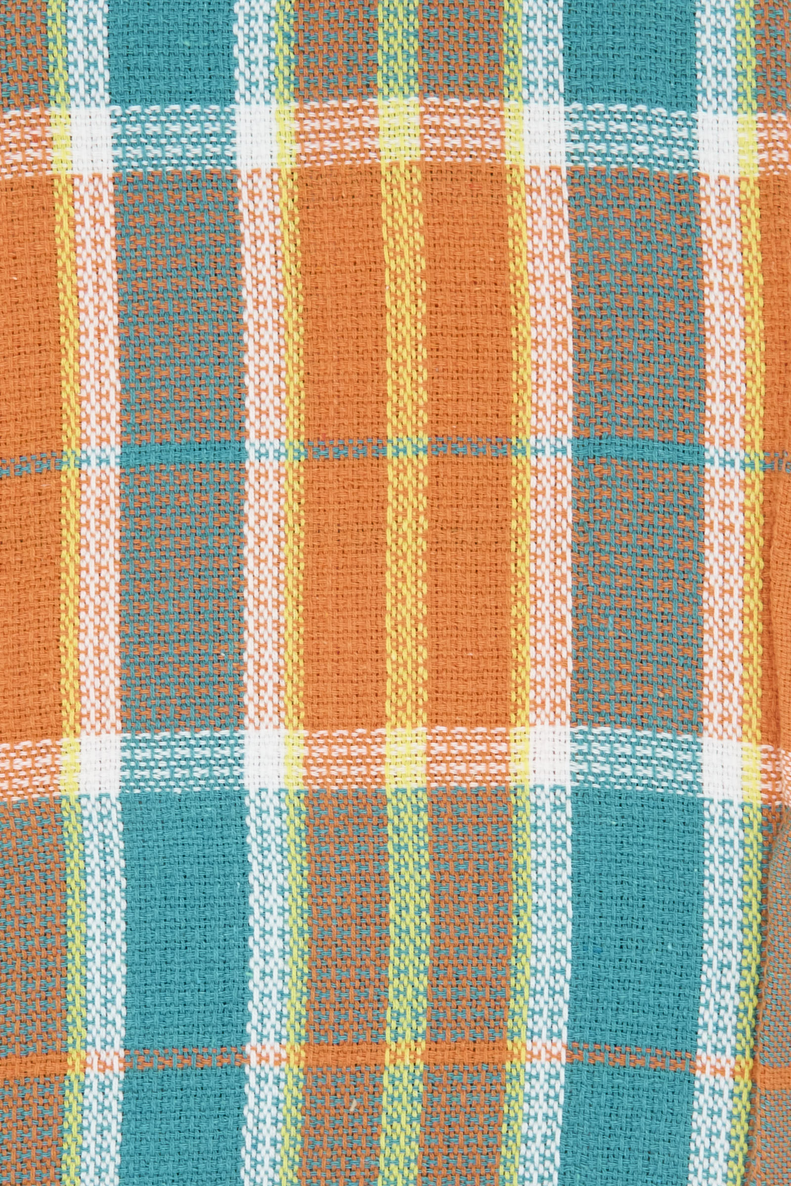 The Auntie Oti Dobby Plaid Towel in Orange and Green features a handwoven plaid pattern with orange, green, teal, yellow, and white checks.