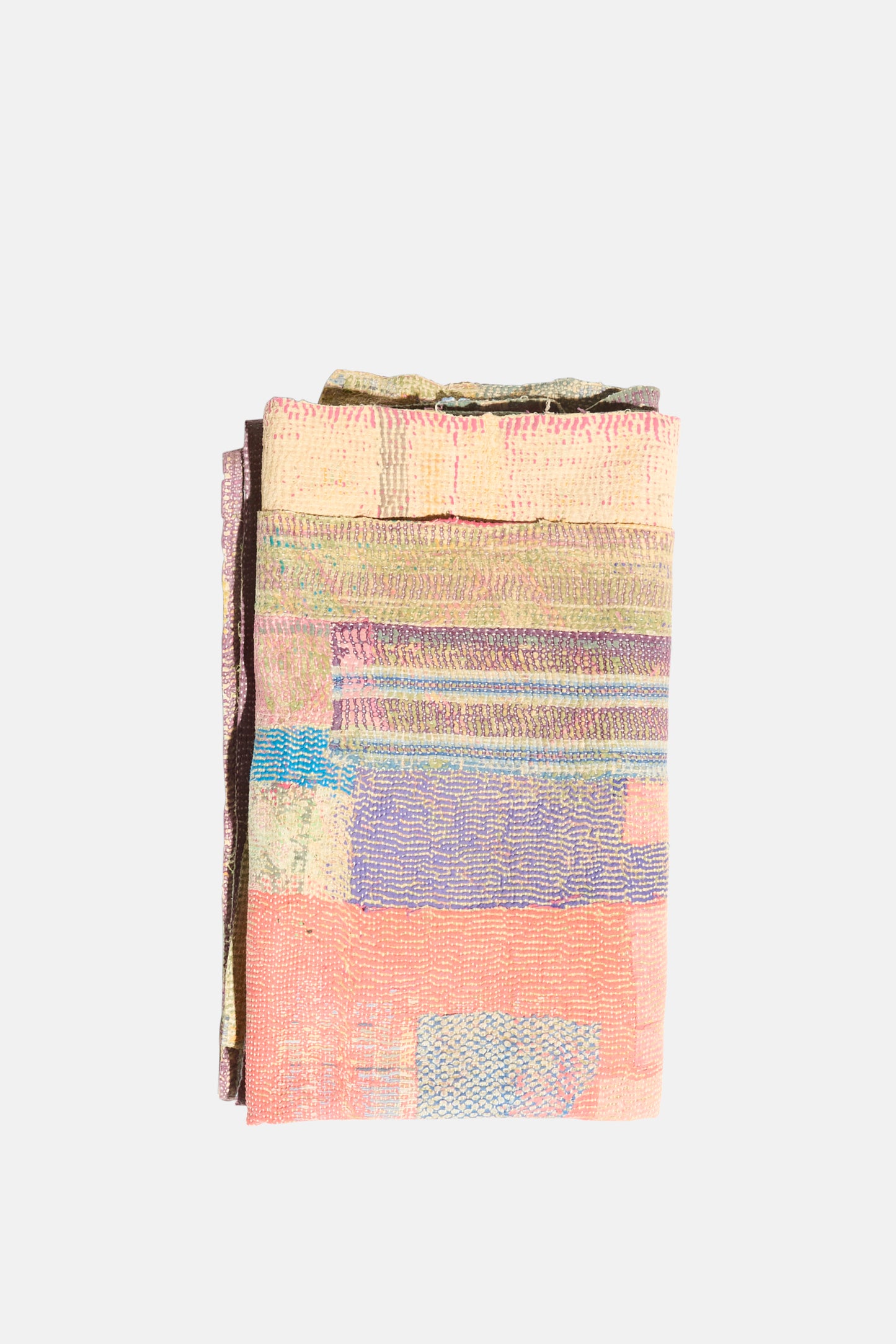 The One of a Kind Vintage Kantha Quilt III by Auntie Oti is a folded, multicolored patchwork quilt crafted from upcycled cotton in various pastel rectangular patterns, displayed against a plain white background.