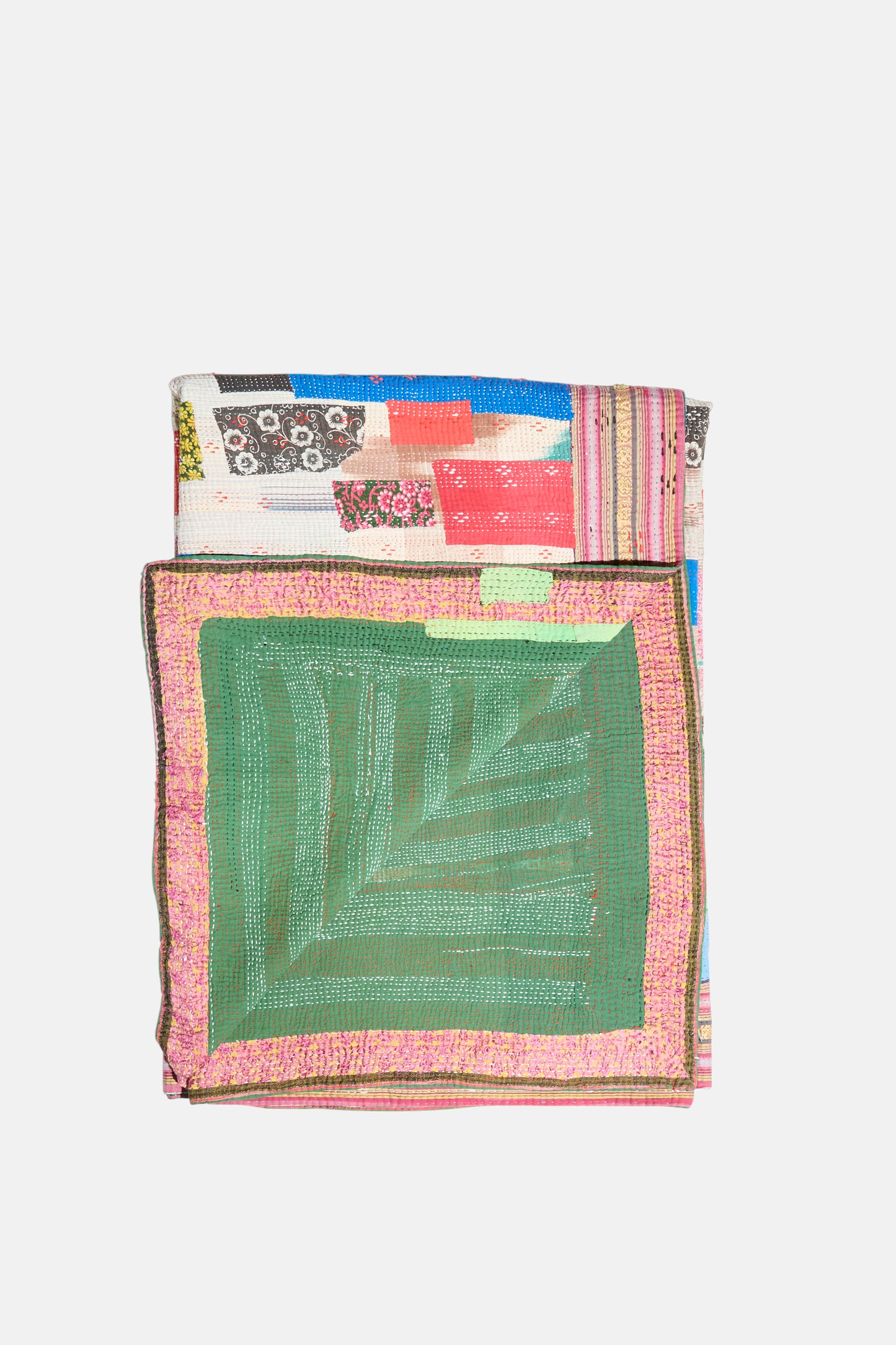 The One of a Kind Vintage Kantha Quilt IV by Auntie Oti is a handmade patchwork blanket with green squares, pink borders, and multicolored patterned fabric strips.