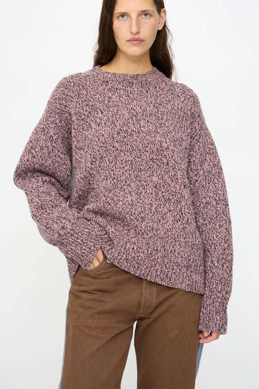 A person wearing the B Sides Braided Lambswool Crew in Etowah Twist stands against a plain white background, paired with brown pants.