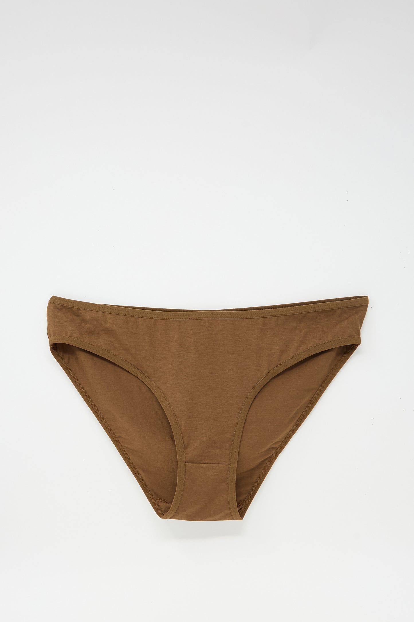 The Bell Pant in Ocular by Baserange is a brown bikini bottom featuring a simple, clean design and elastic trim, displayed on a white background.