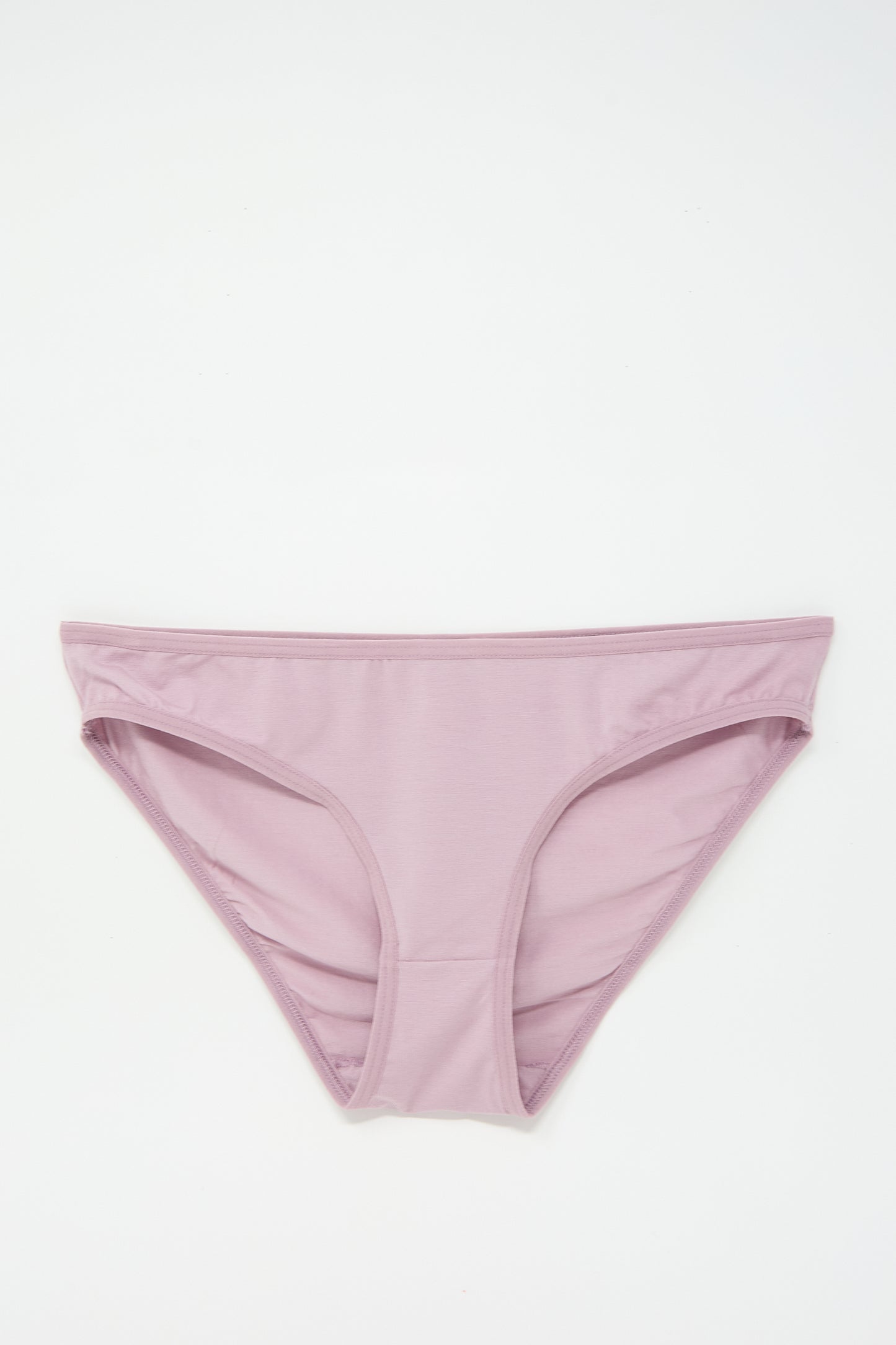 A pair of Bell Pant in Still Purple underpants by Baserange made from soft bamboo jersey is displayed against a white background.