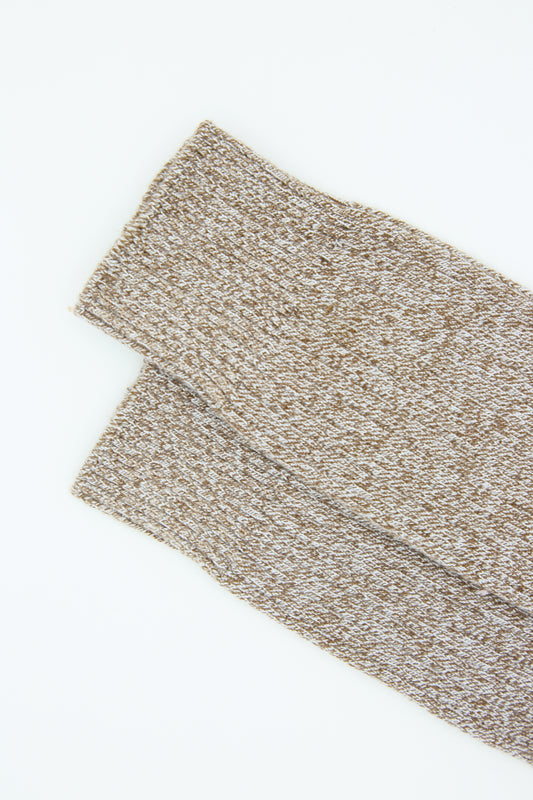 A Baserange grey brown melange textured scarf folded diagonally on a white background.