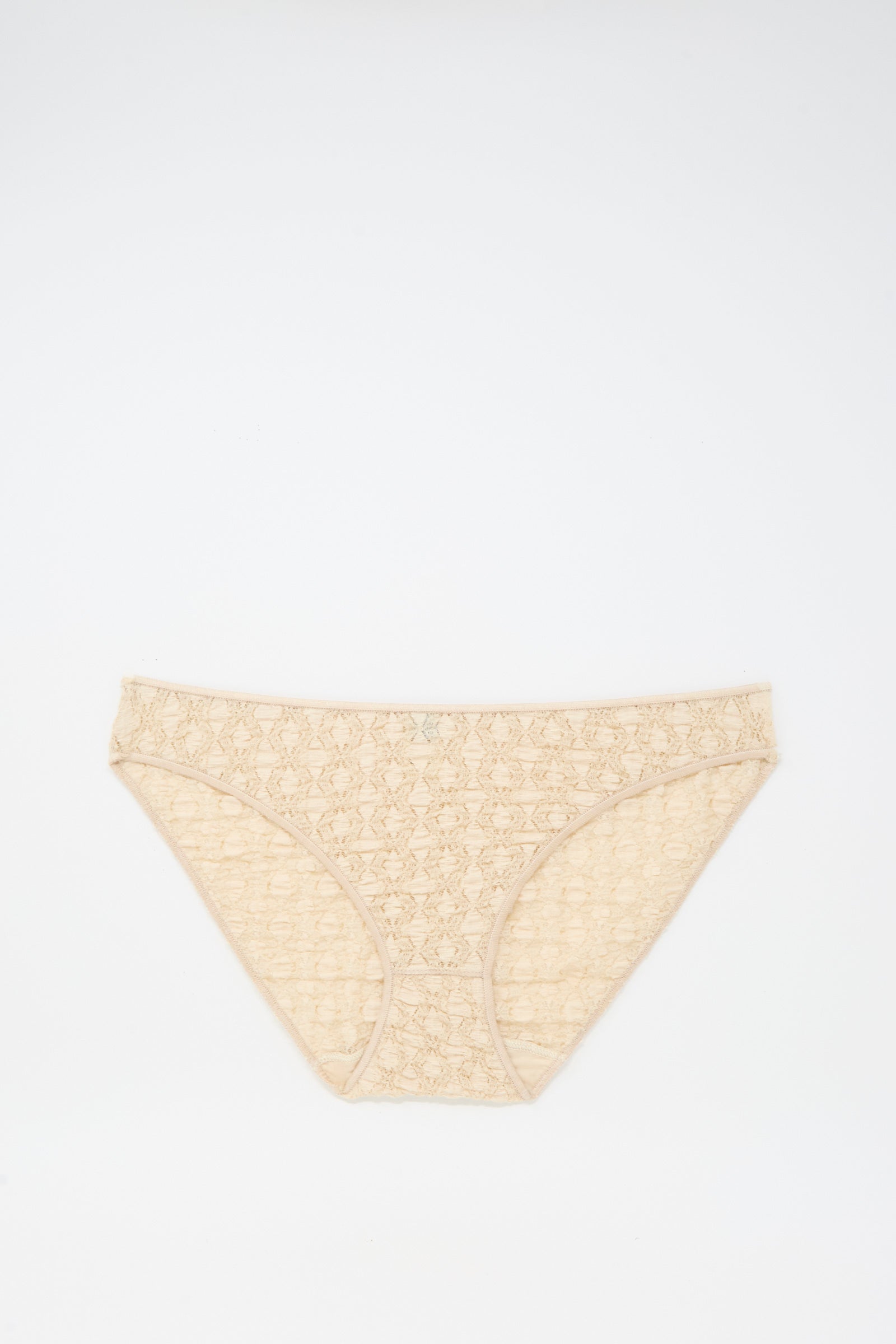 Crescent Pants in Dylan Beige by Baserange, a women's cotton lace brief made in Portugal, shown laid flat on a white background.