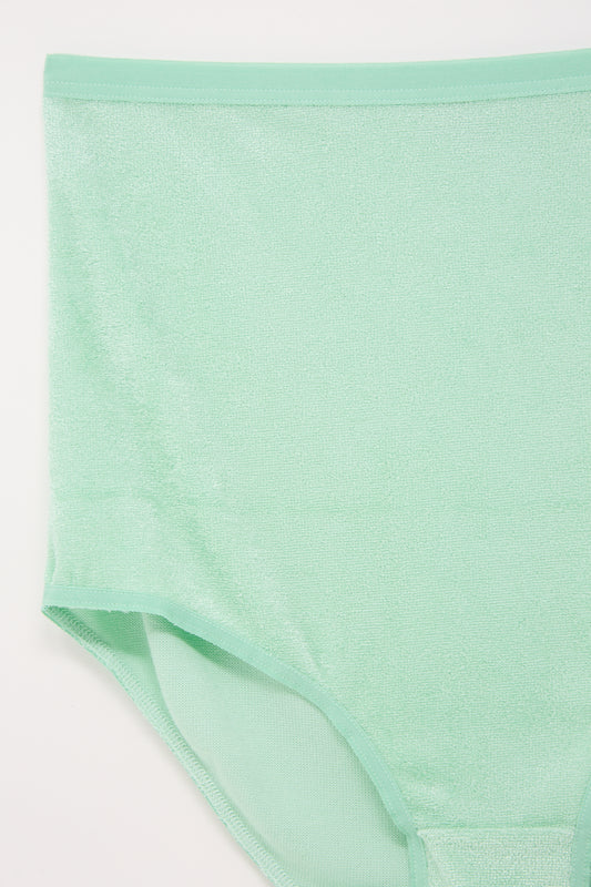 A single Highwaist Bell Pant in Telu Green brief underwear on a white background by Baserange.