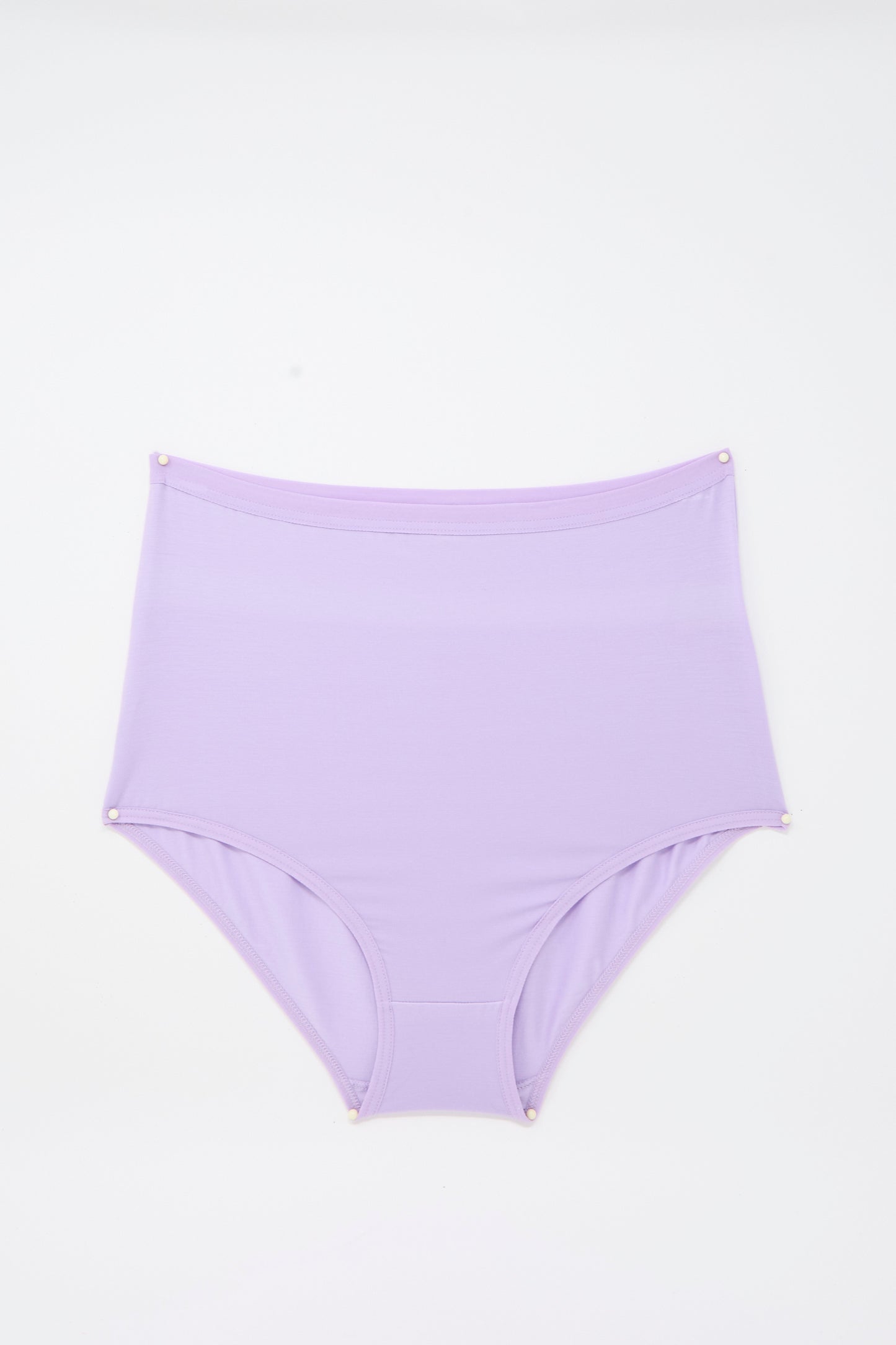 Highwaist Bell Pants in One Purple by Baserange, high-waisted lavender underwear crafted from soft, breathable bamboo lyocell, are shown laid flat on a white background with small pins securing the corners for display—offering eco-friendly comfort in a stylish high-rise silhouette.