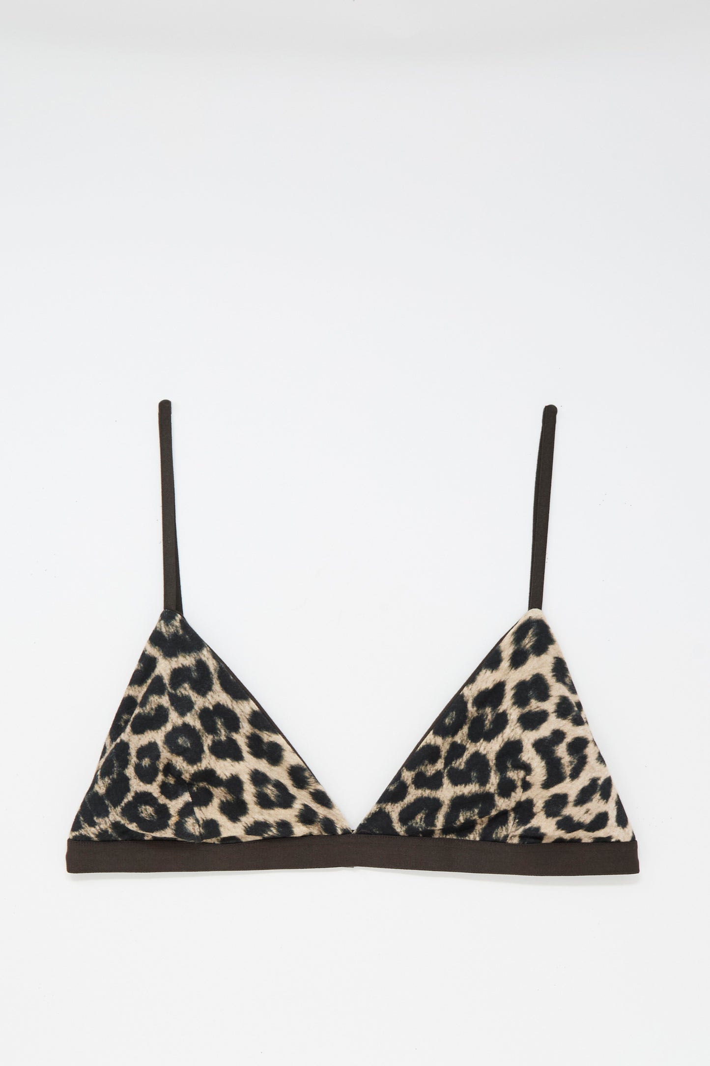Mississippi Bra in Leopard from Baserange—featuring thin black straps and a band, this eye-catching triangle bra showcases bold leopard print on a classic white background, blending striking style with everyday comfort.