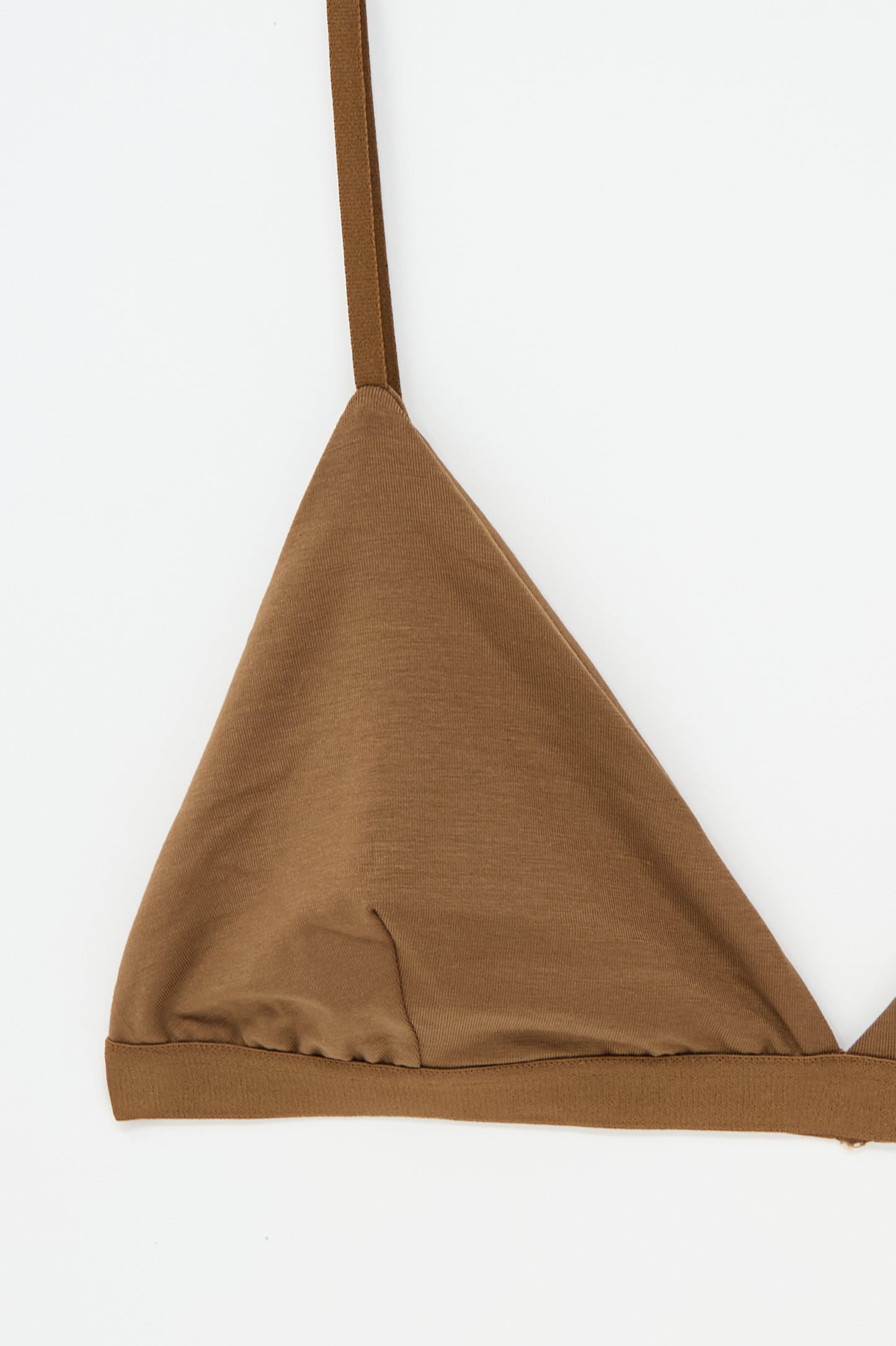 Close-up of the Mississippi Bra in Ocular, crafted by Baserange from soft bamboo lyocell, featuring a single shoulder strap, set against a white background.