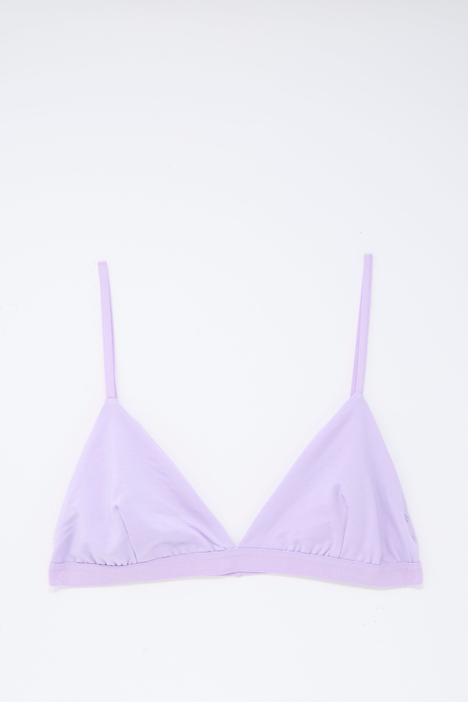 Baserange Mississippi Bra in One Purple, a light purple bamboo lyocell triangle bra with thin adjustable straps, laid flat on a white background.