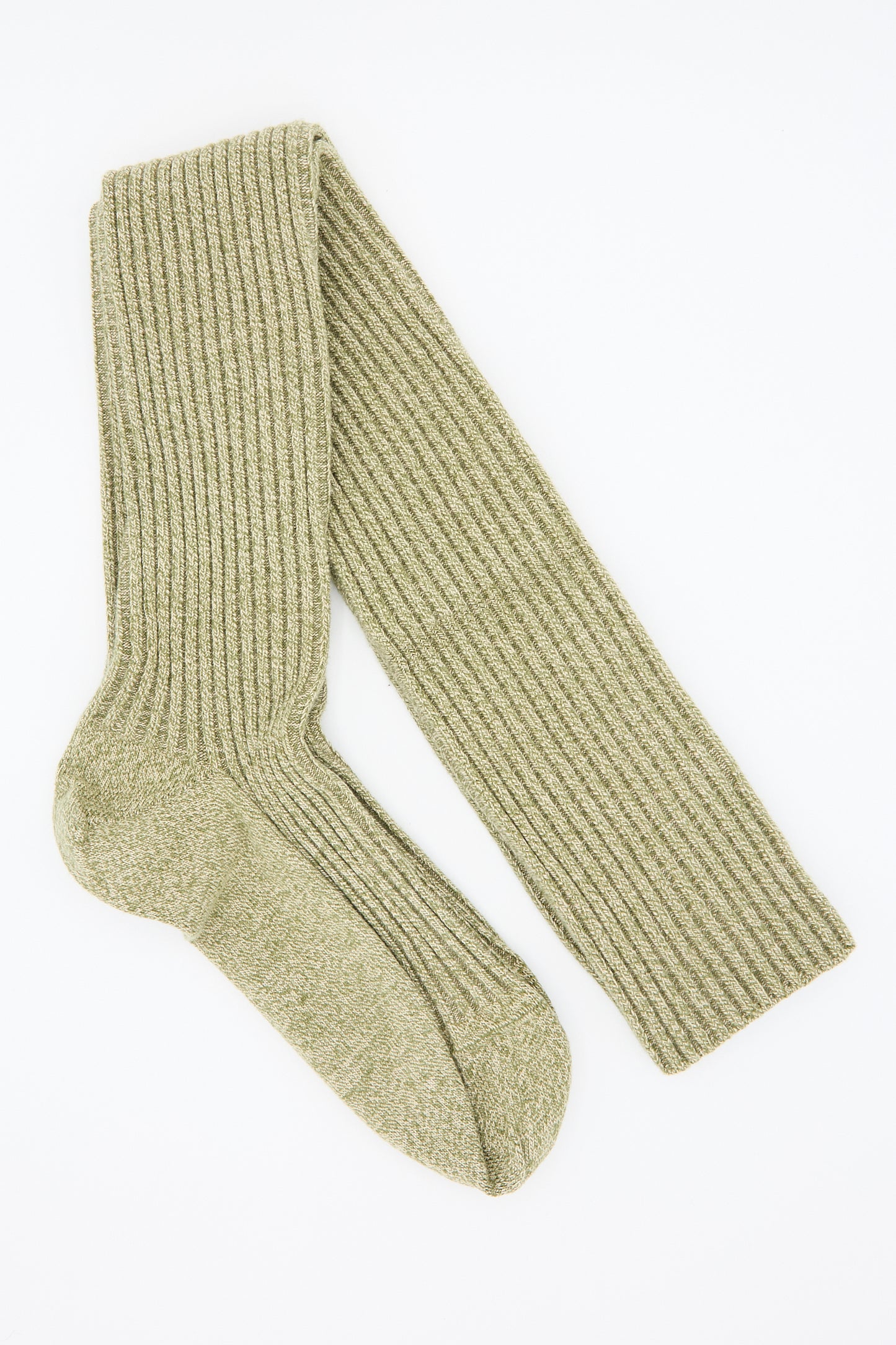 A single Overknee Sock in Tre Green and Su Tan by Baserange, crafted from organic cotton, is displayed against a white background.