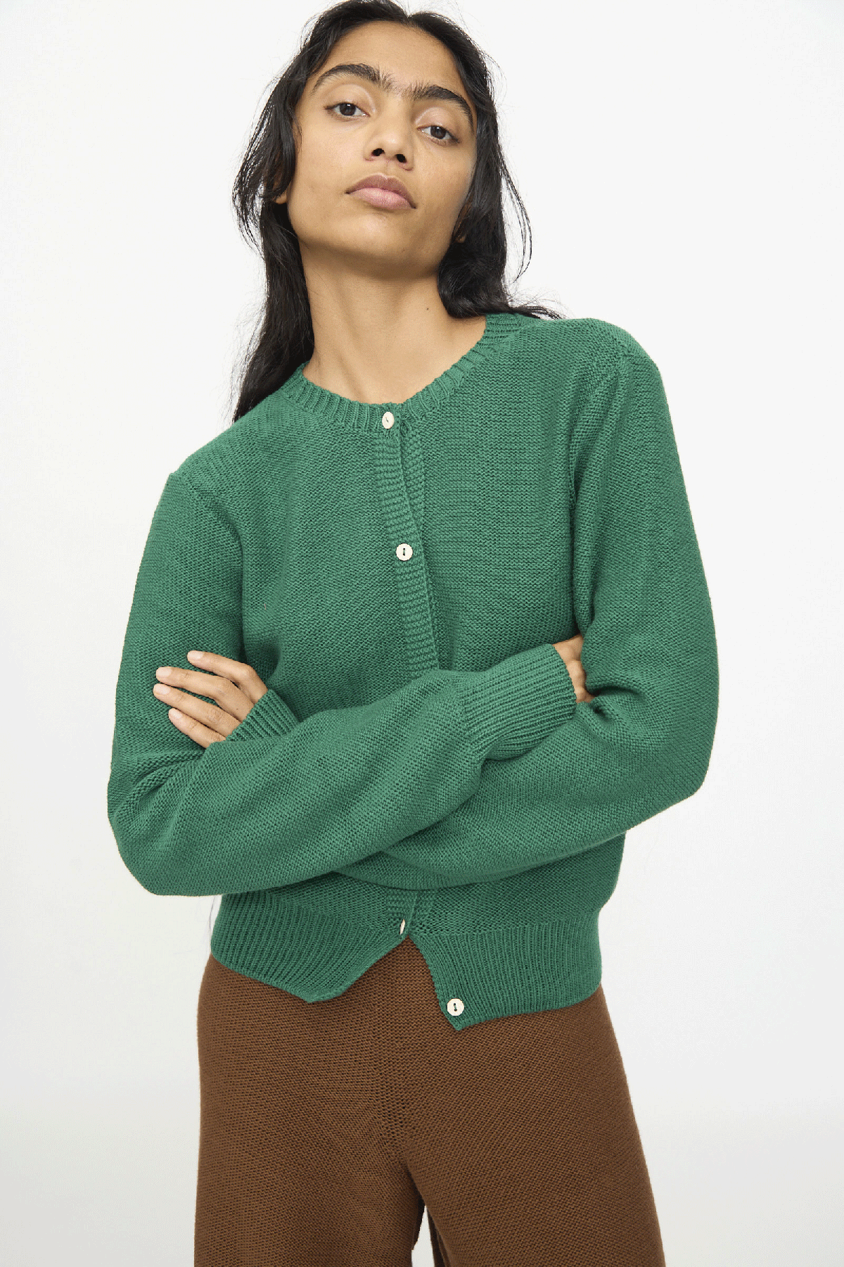 A gif of a model wearing pieces from Baserange's PF25 collection against a white background.