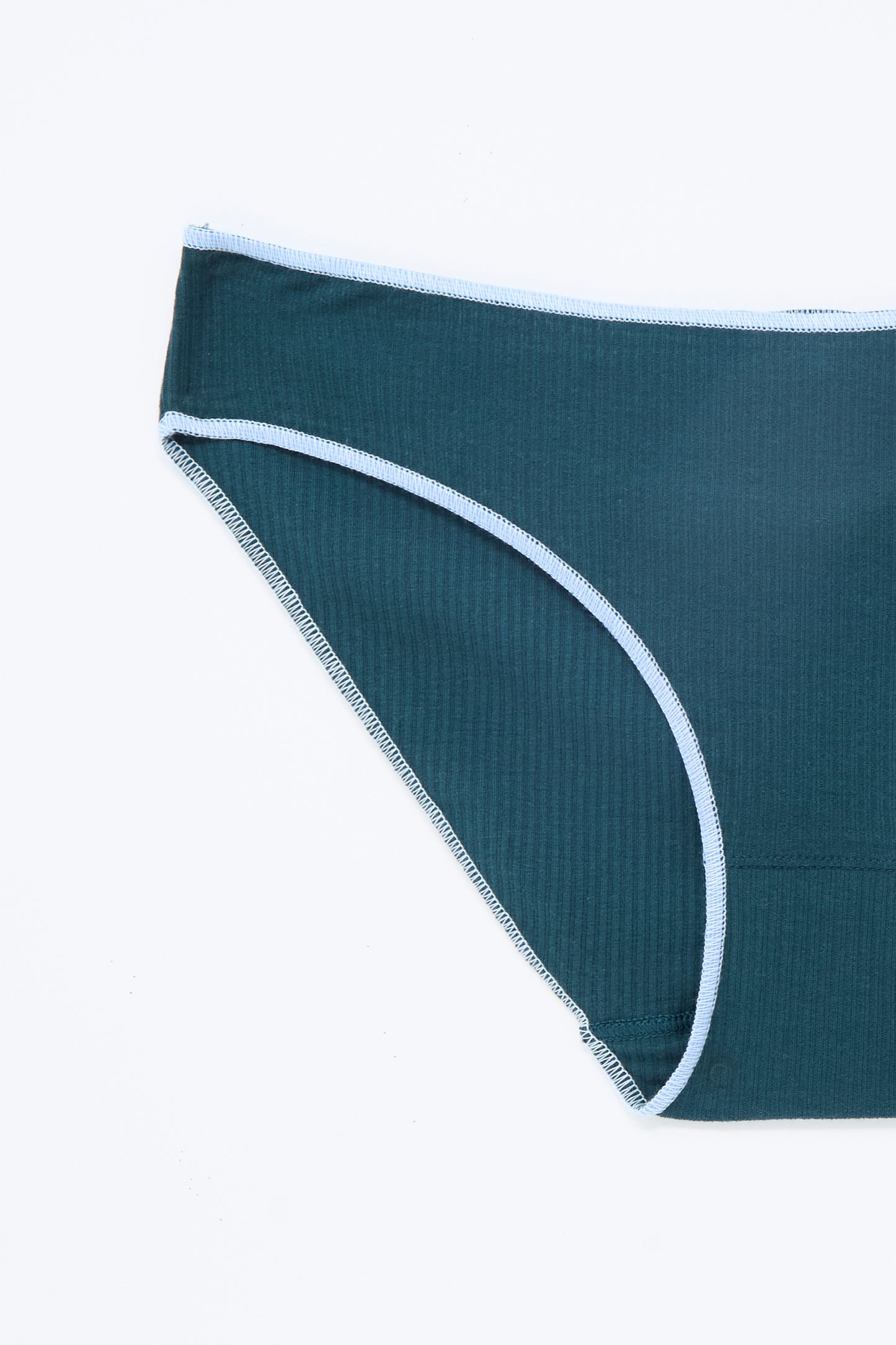 Baserange Pam Pants in Hirsu Green are bikini-style, low-rise briefs crafted from dark teal cotton rib, featuring a comfortable elastic waistband and light blue trim, shown against a white background.