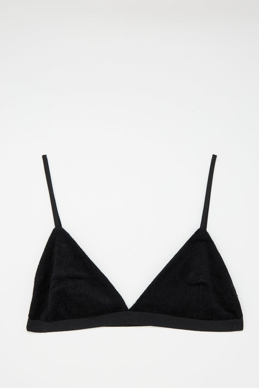 The Velour Mississippi Bra in Black by Baserange, crafted from repurposed fabrics and featuring thin straps, is displayed on a white background.