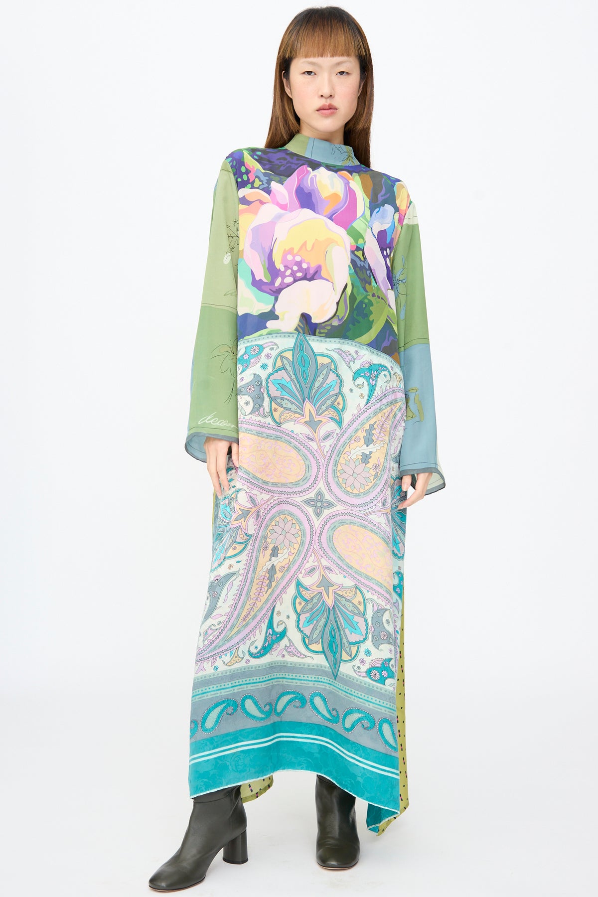 A Bettina Bakdal Classic Mandarin Collar Dress in Hedwig Arheim: a long-sleeved, ankle-length vintage silk dress with a multicolored floral and paisley print, worn with black ankle boots.