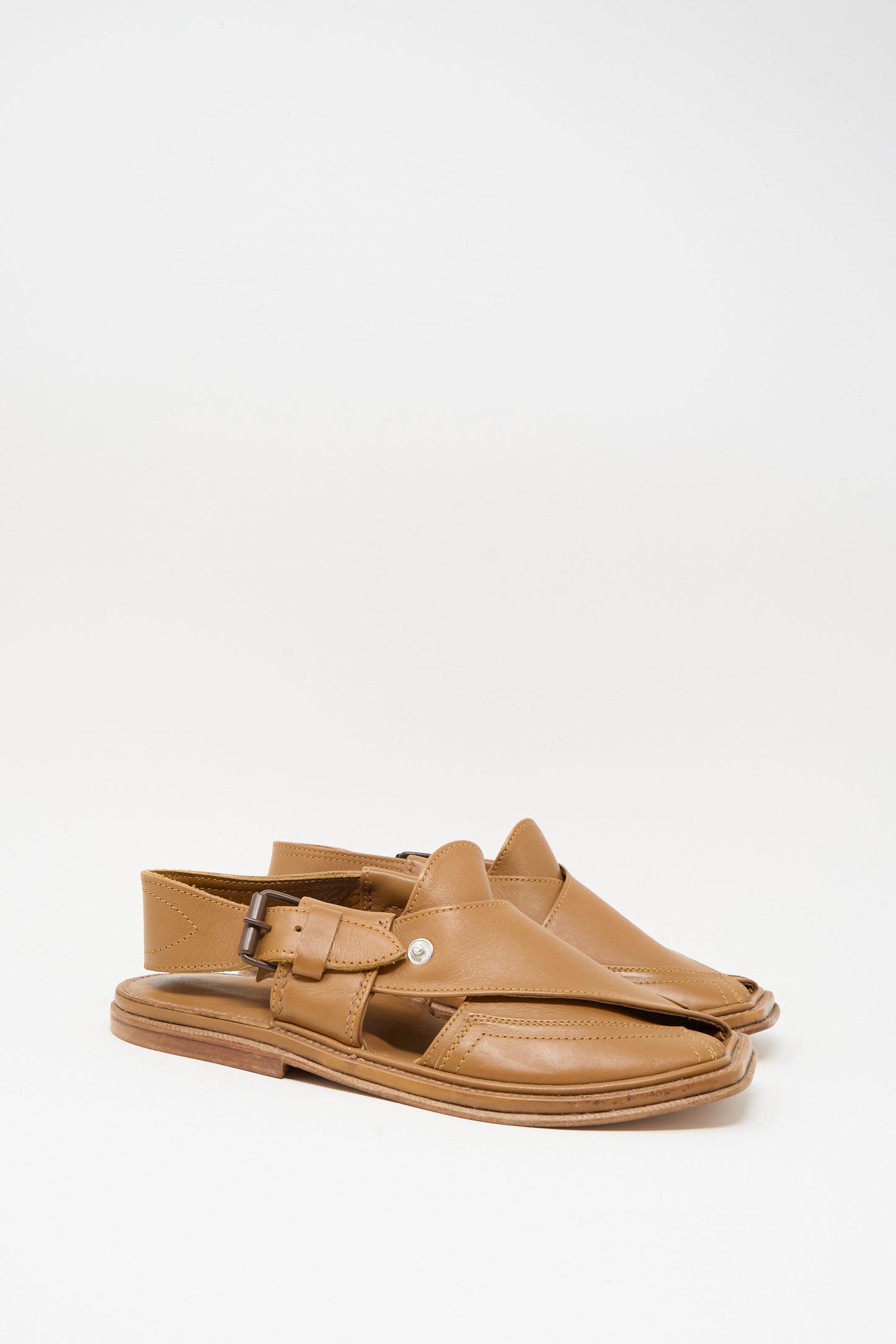 The Bless No. 08 Desertsandals in Light Brown are leather sandals with open sides, closed toes, buckled ankle straps, and a classic crossover design, displayed on a plain white background.