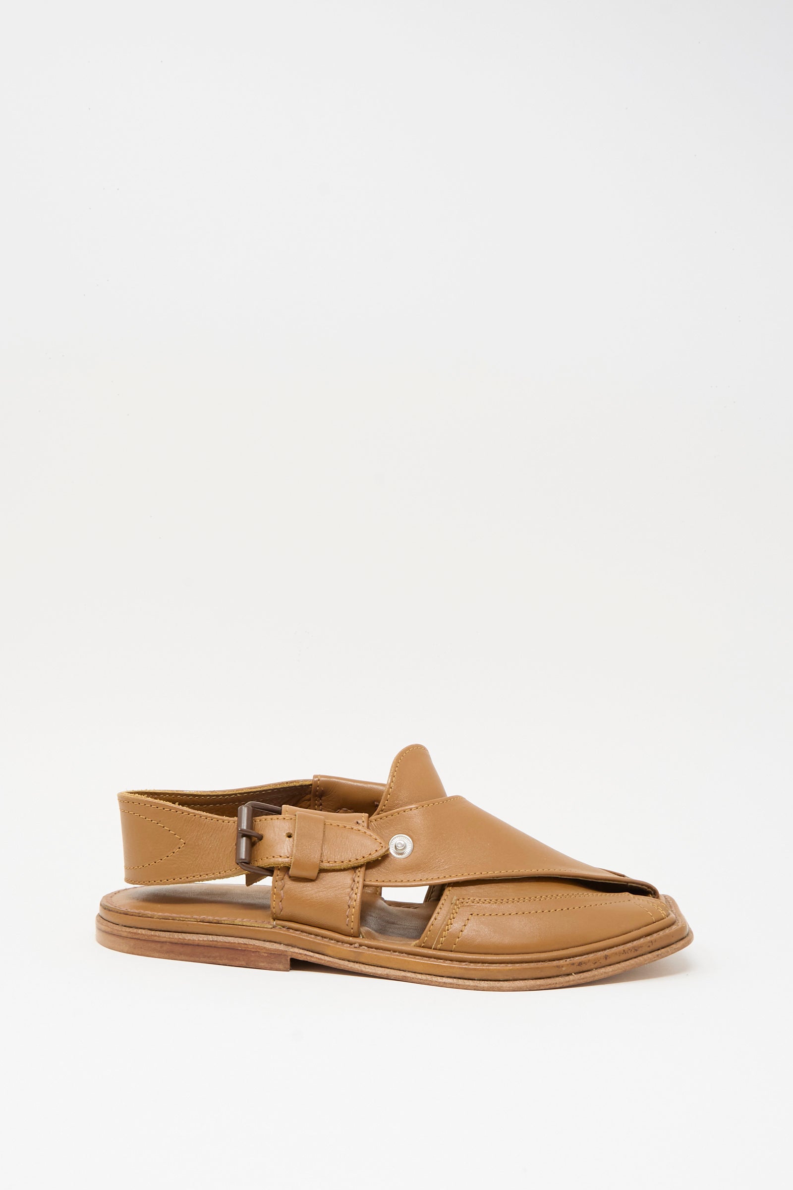 The Bless No. 08 Desertsandals in Light Brown feature a leather crossover design with a closed toe, side buckle, and open heel, displayed on a plain white background.