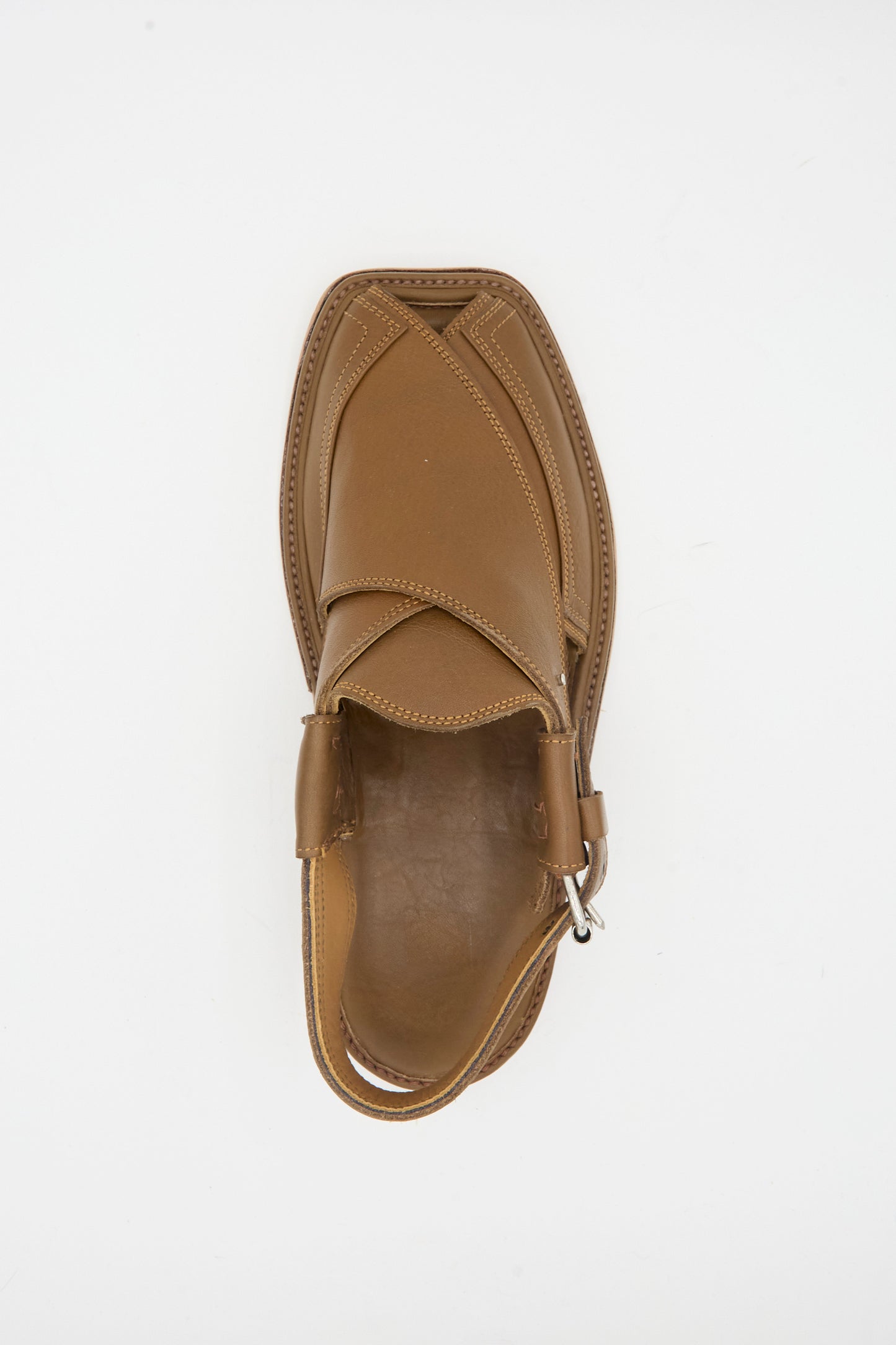Top view of Bless No. 08 Desertsandals in dark brown leather, French-made with overlapping straps, closed toe, side buckle, and back strap, displayed on a white background.