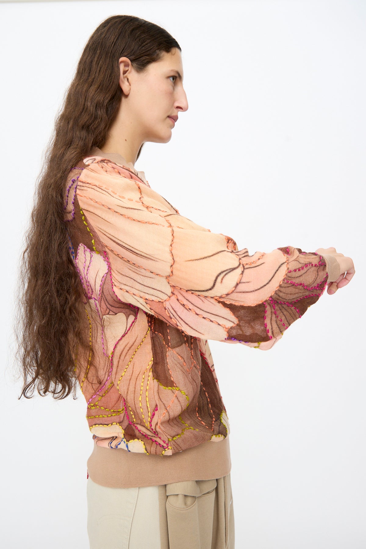 Bless No. 82 Embroidered Sweater in Multicolor Beige and Rosé: a lightweight tan sweater featuring a pink and brown abstract floral print outlined in colorful embroidered stitching.