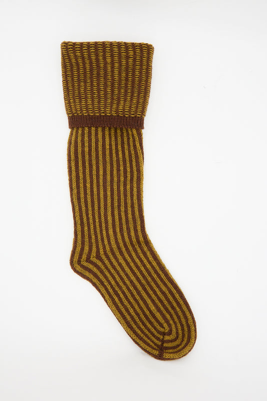 The Cawley British Merino Wool Sock in Bordeaux and Goldfinch Stripe is a single, mid-calf sock with vertical stripes, a ribbed cuff and heel, crafted from British merino wool and shown on a plain white background.