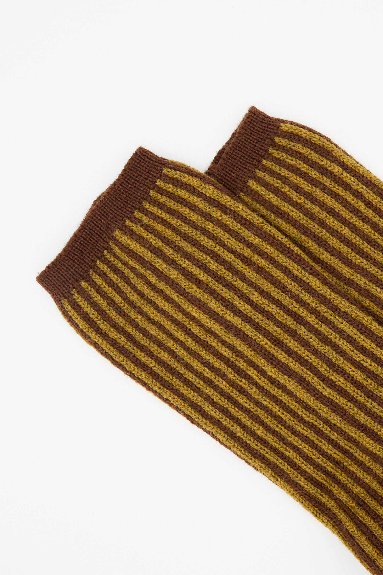 Close-up of the Cawley British Merino Wool Sock in Bordeaux and Goldfinch Stripe, featuring mid-calf length with bold vertical stripes, displayed on a white background.