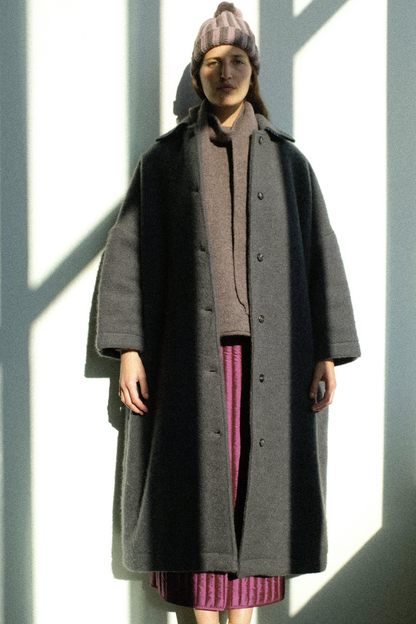 Person wearing pieces from Cawley's FW25 collection standing against a white background.