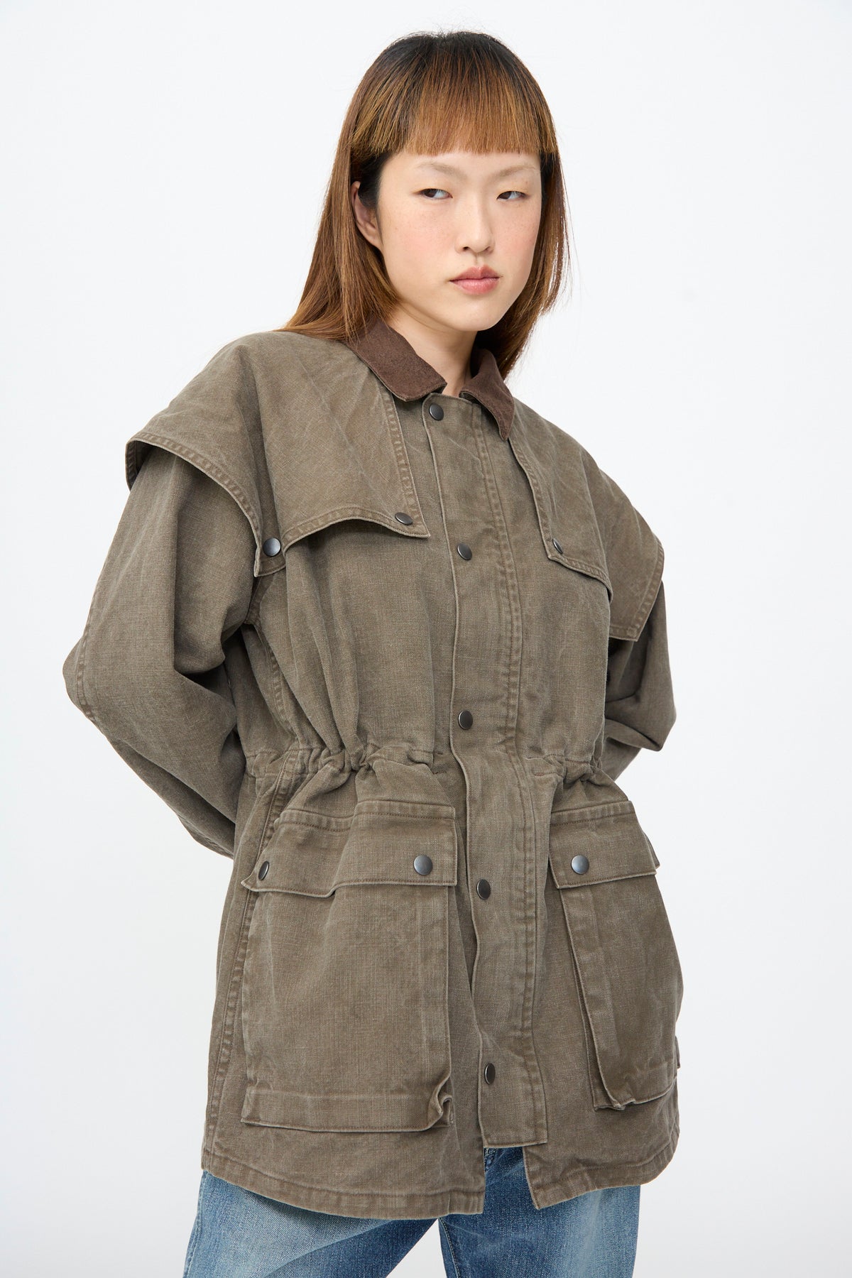 Chimala Sulfer Dyed Canvas Lumber Coat in Brown featuring a button-up front, a dark brown corduroy collar, and two front flap pockets.
