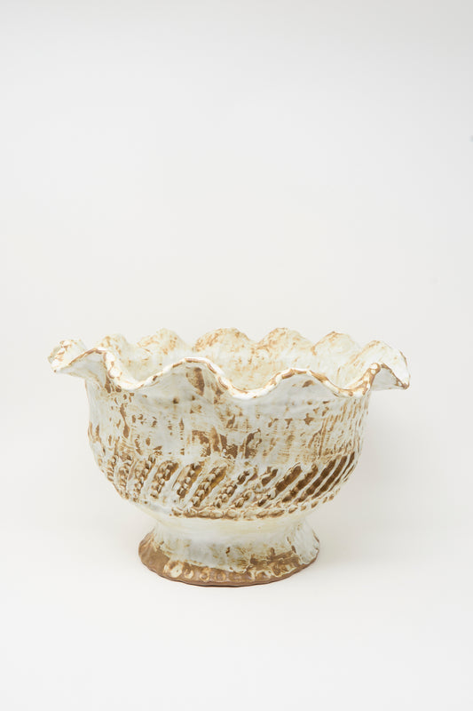 The Large Ridge Wave Bowl by Claire Resnick Ceramics is a hand-built ceramic piece featuring a textured, scalloped rim and a beige and brown speckled glaze, made in the USA and photographed against a white background.