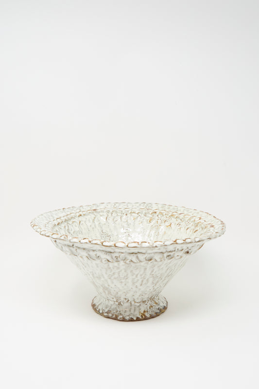 The Textured Bowl in White by Claire Resnick Ceramics features a wide, shallow shape with a scalloped, textured rim and a speckled white glaze, displayed against a plain white background.