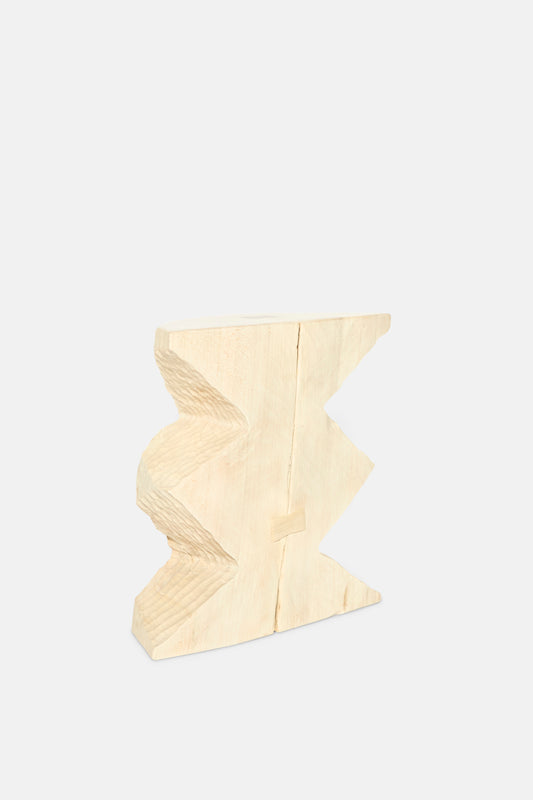 The Bleached Maple Skinny II by Cody Brgant is a handmade, light-hued rectangular wooden sculpture with zigzag-edged cutouts on both sides, crafted in Brooklyn from maple furniture offcuts and shown against a white background.