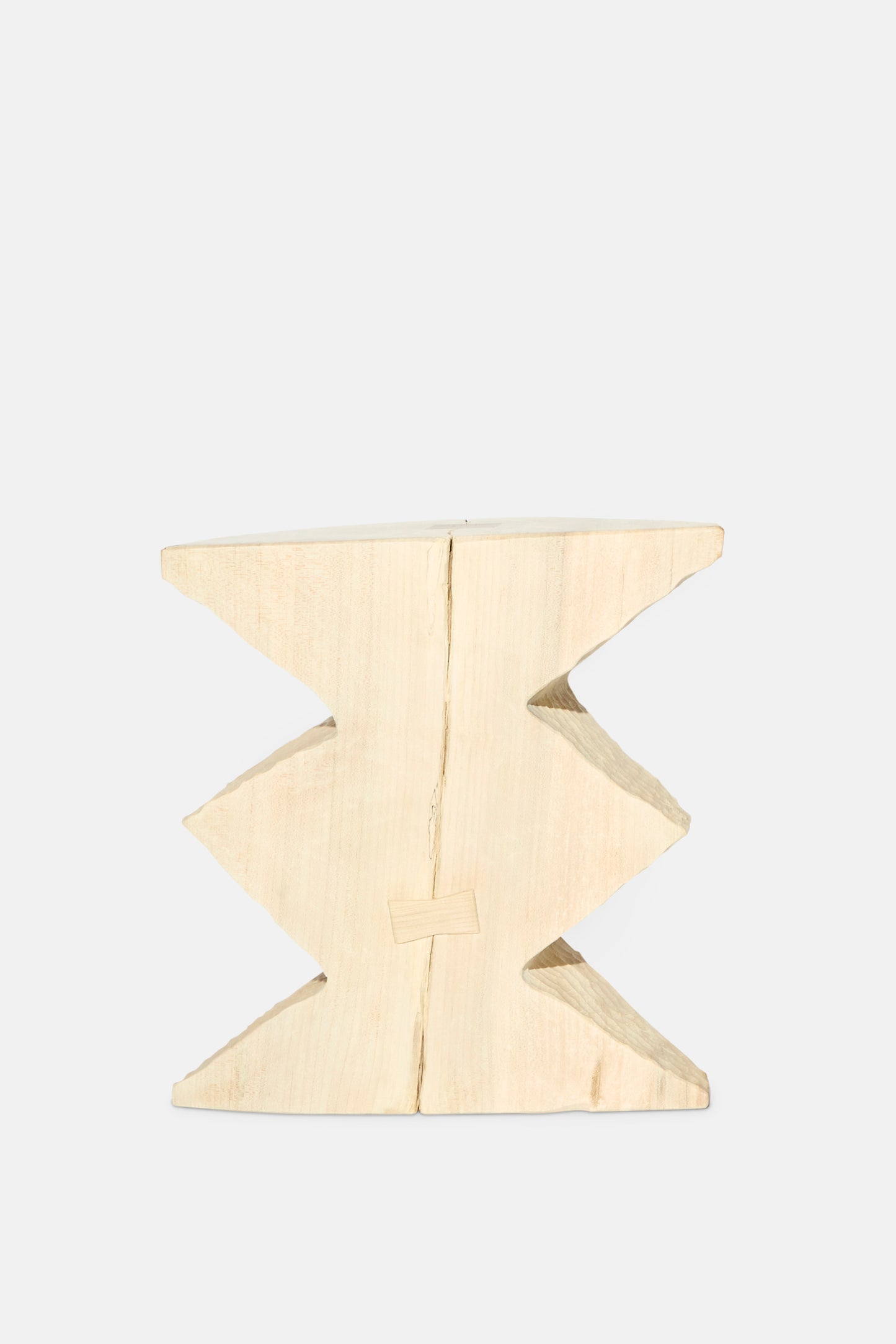 The Bleached Maple Skinny II by Cody Brgant is a handmade, light-toned geometric wooden stool with zigzag sides, ideal as a sculptural side table and shown against a plain white background.