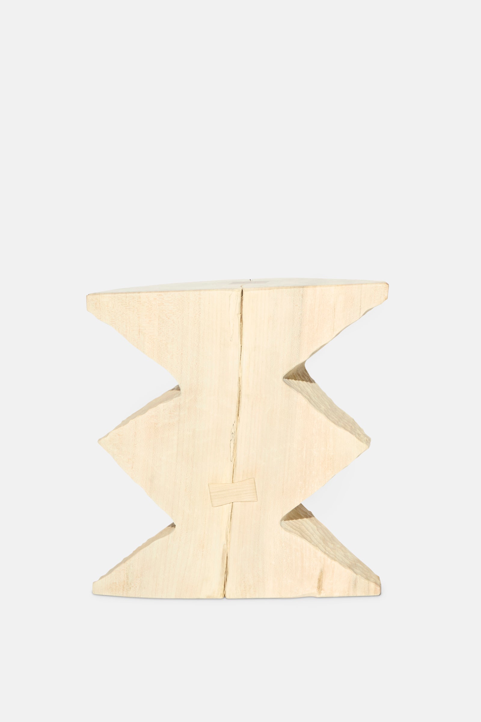 The Bleached Maple Skinny II by Cody Brgant is a handmade, light-toned geometric wooden stool with zigzag sides, ideal as a sculptural side table and shown against a plain white background.