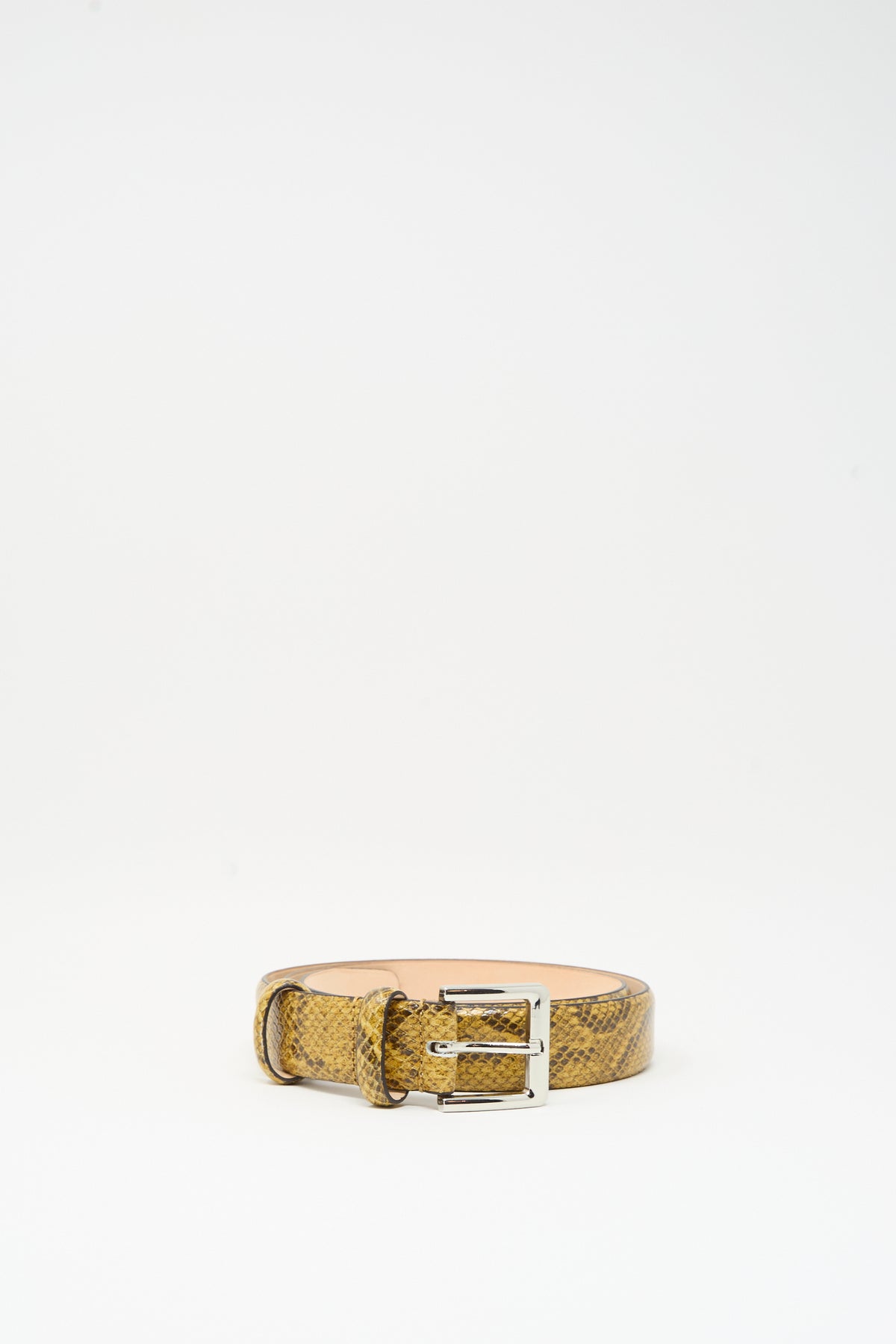 Classic Belt in Snake, a yellow snake print leather belt with a silver-tone buckle.